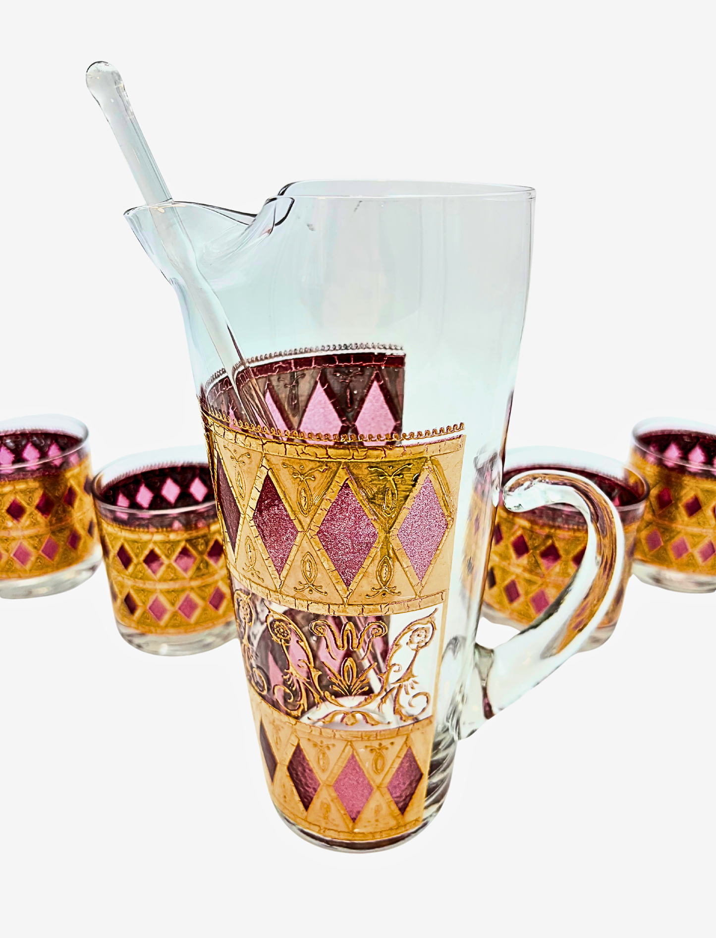 CULVER JEWELED MAGENTA AND 22K GOLD COCKTAIL SET WITH PITCHER AND STIR CIRCA 1960S