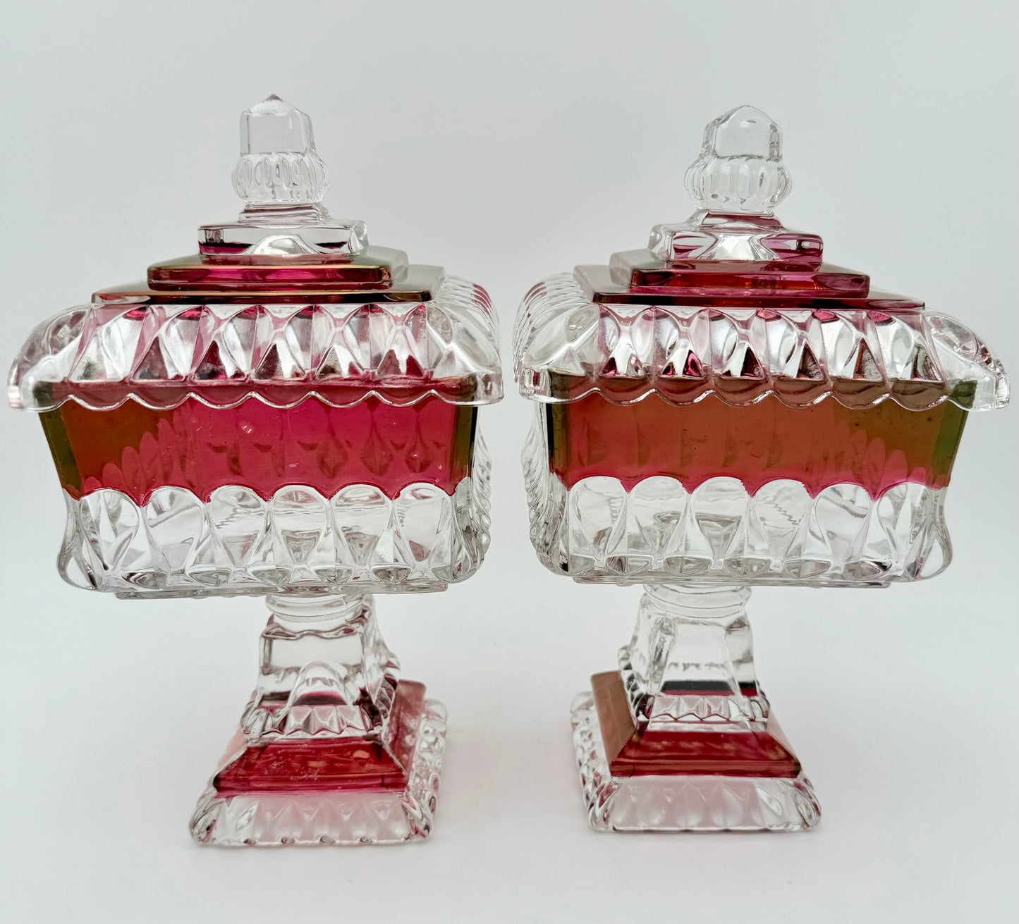 PAIR OF ANTIQUE RUBY STAINED EAPG LIDDED SWEETMEAT JARS • U.S. GLASS • 1890s VICTORIAN PEDESTAL COMPOTES