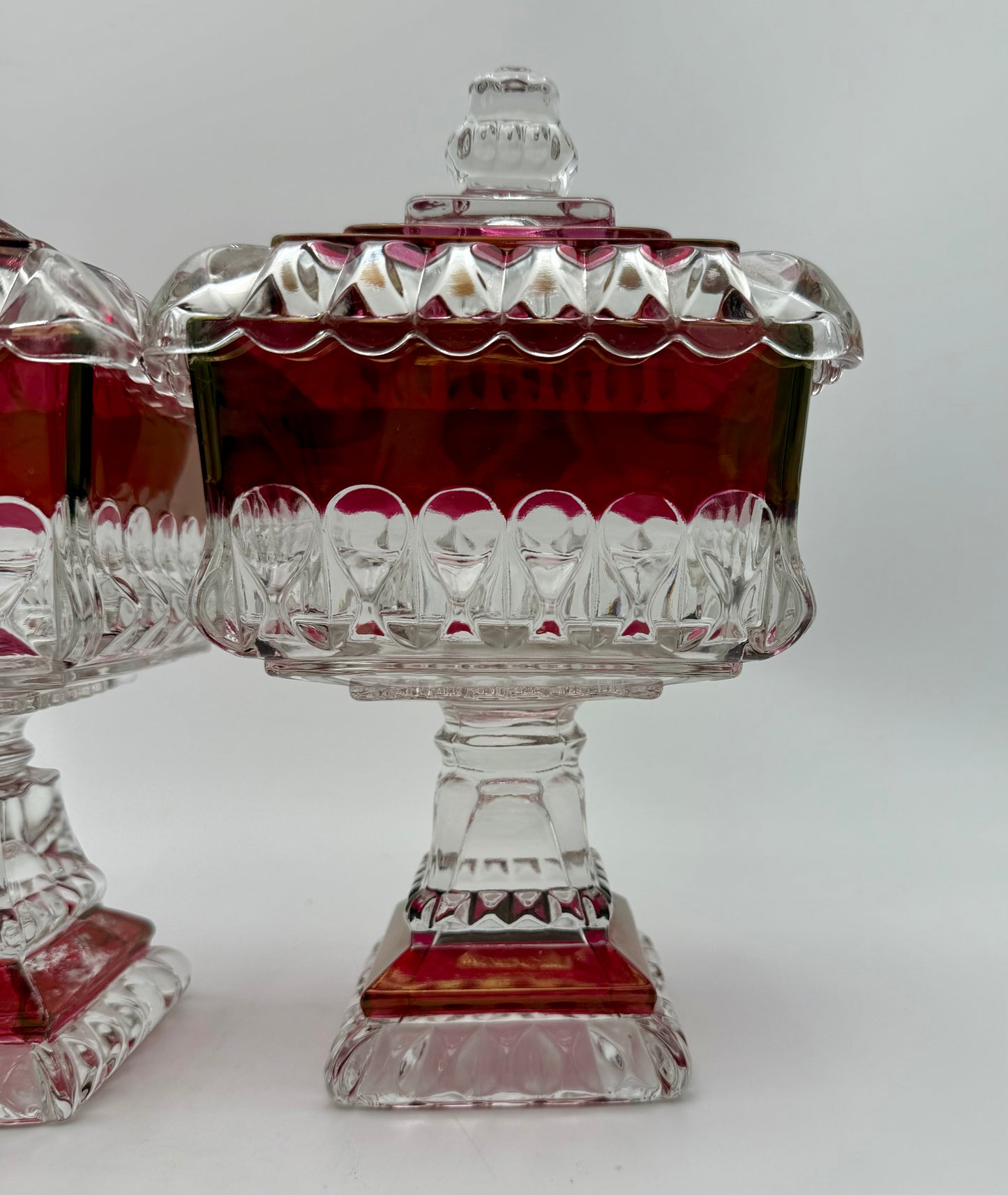PAIR OF ANTIQUE RUBY STAINED EAPG LIDDED SWEETMEAT JARS • U.S. GLASS • 1890s VICTORIAN PEDESTAL COMPOTES