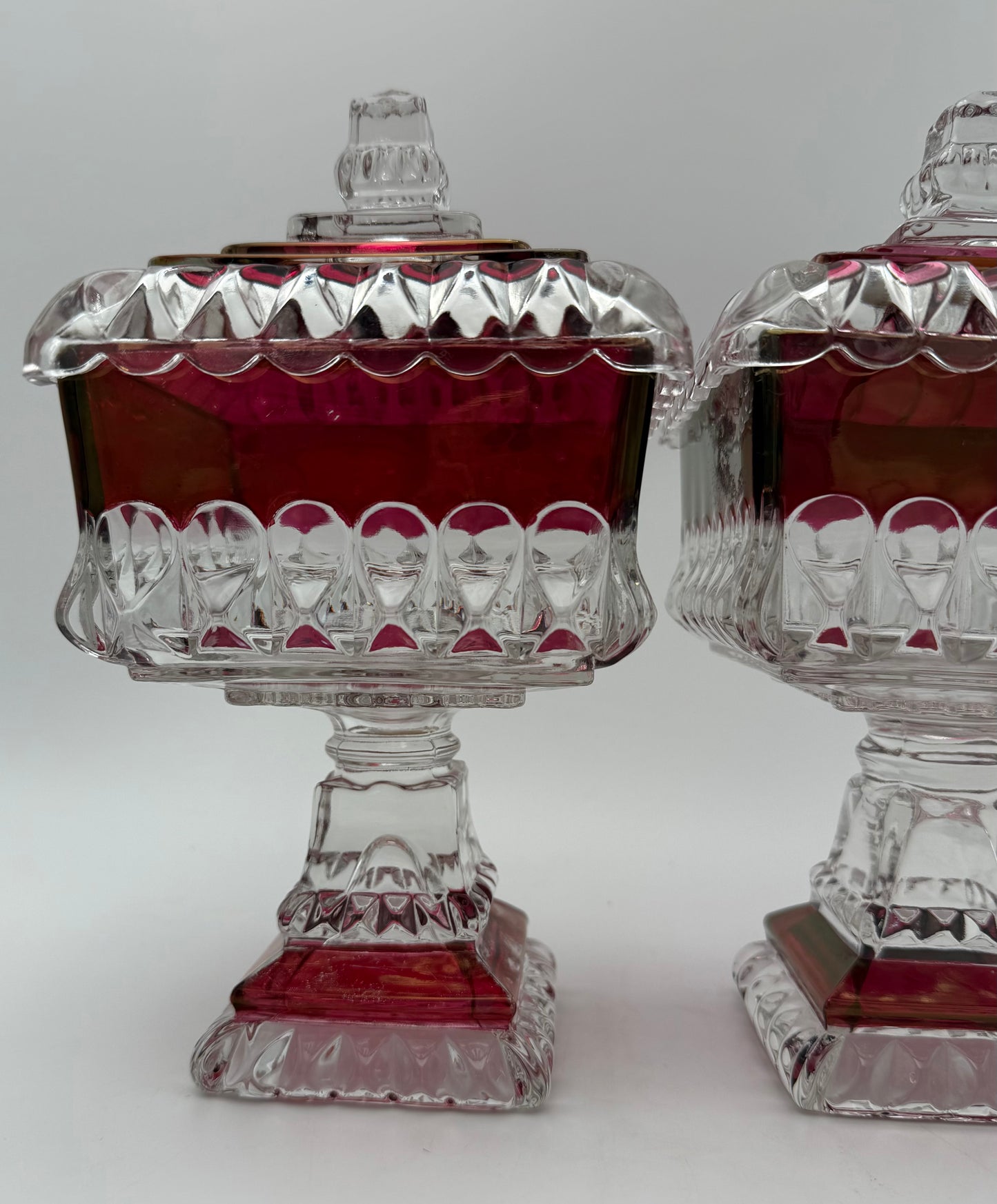 PAIR OF ANTIQUE RUBY STAINED EAPG LIDDED SWEETMEAT JARS • U.S. GLASS • 1890s VICTORIAN PEDESTAL COMPOTES