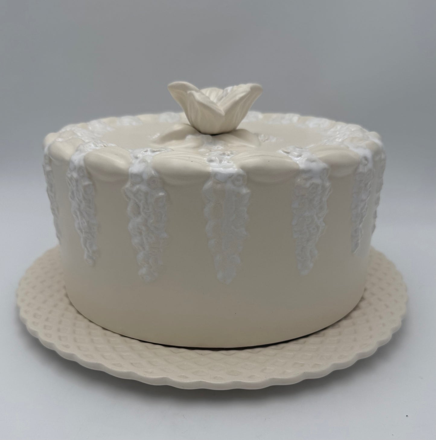 VINTAGE PORTUGUESE EARTHENWARE COVERED DOME WITH MATCHING PLATE – CREAM & WHITE FLORAL RELIEF – 12.5”
