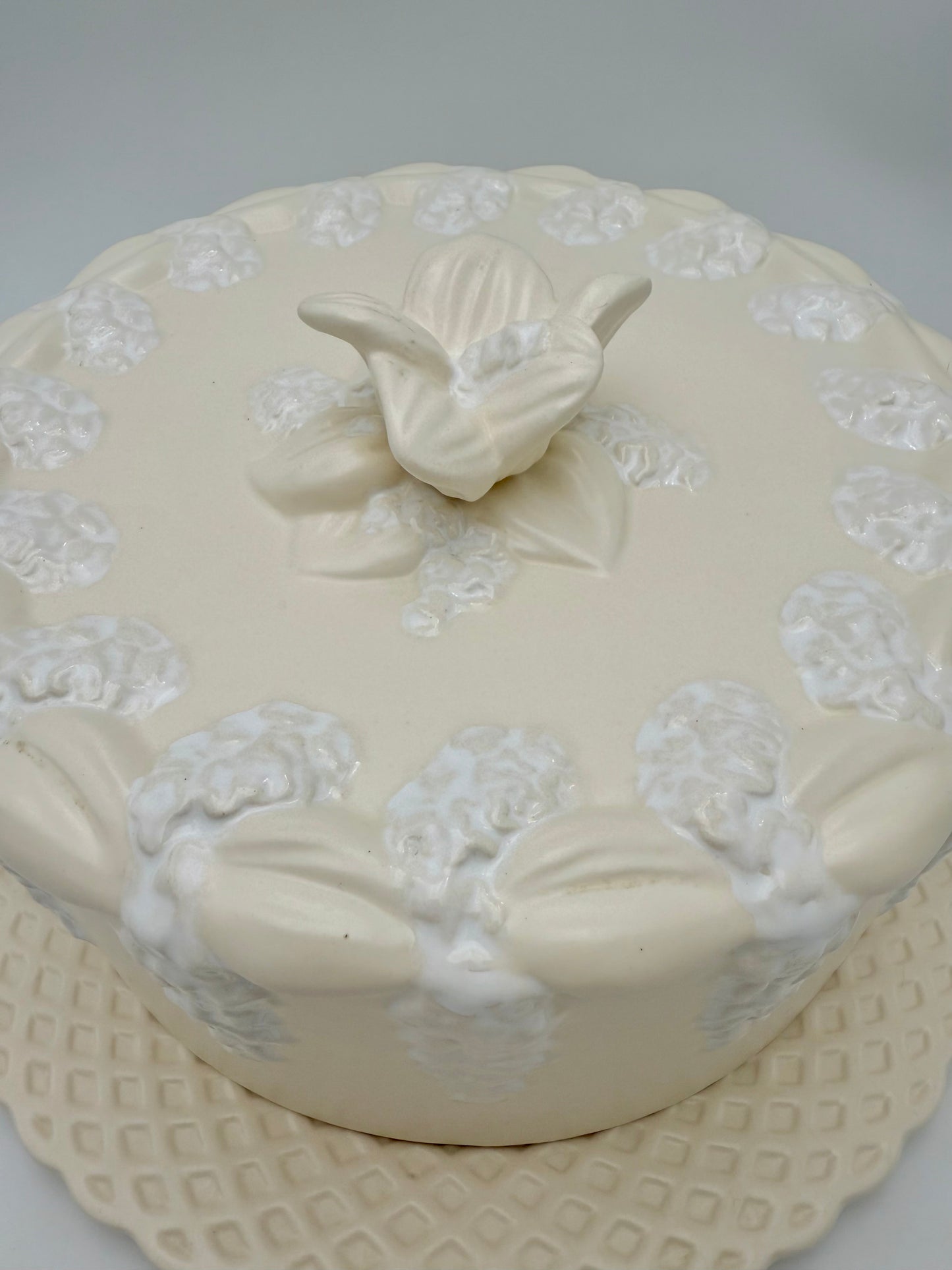 VINTAGE PORTUGUESE EARTHENWARE COVERED DOME WITH MATCHING PLATE – CREAM & WHITE FLORAL RELIEF – 12.5”