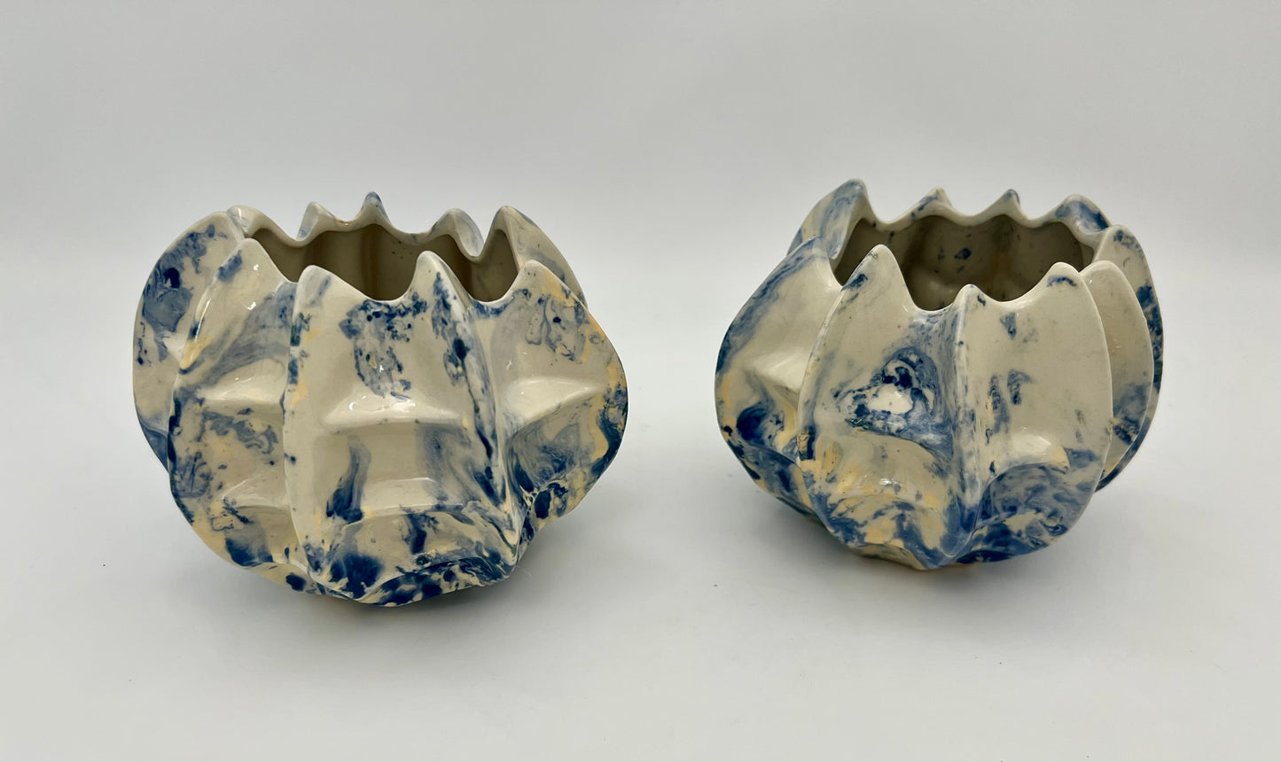 PAIR OF VINTAGE ABSTRACT BLUE AND WHITE CERAMIC PLANTERS/CANDLE HOLDERS