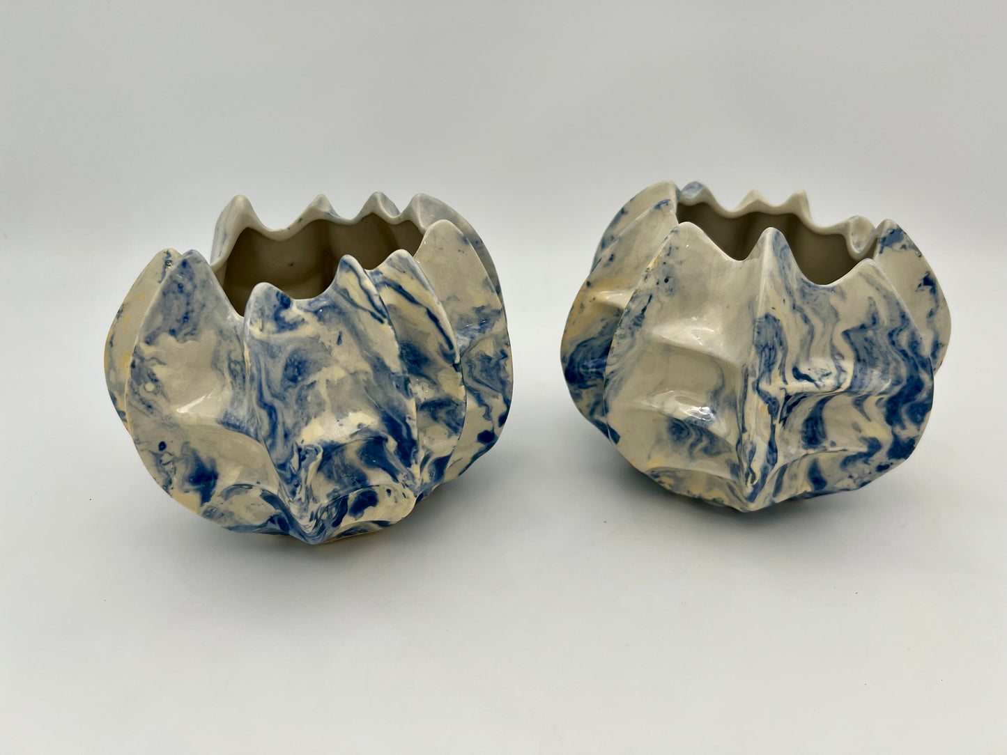 PAIR OF VINTAGE ABSTRACT BLUE AND WHITE CERAMIC PLANTERS/CANDLE HOLDERS