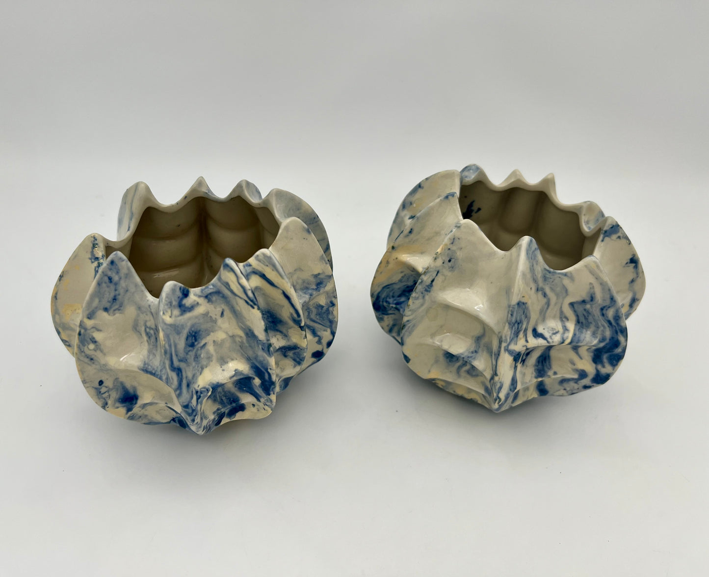 PAIR OF VINTAGE ABSTRACT BLUE AND WHITE CERAMIC PLANTERS/CANDLE HOLDERS