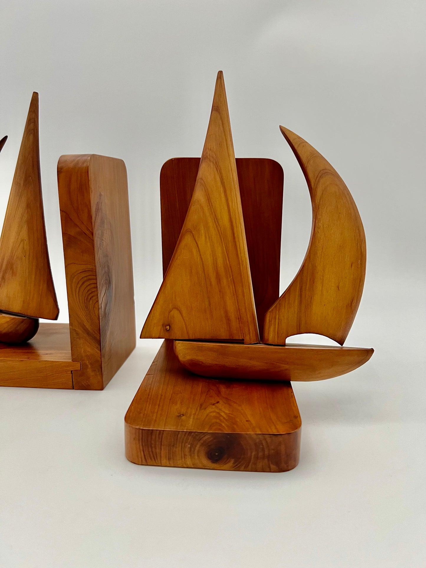 PAIR OF TEAK MIDCENTURY SWIVELING SAILBOAT BOOK ENDS, CIRCA 1965