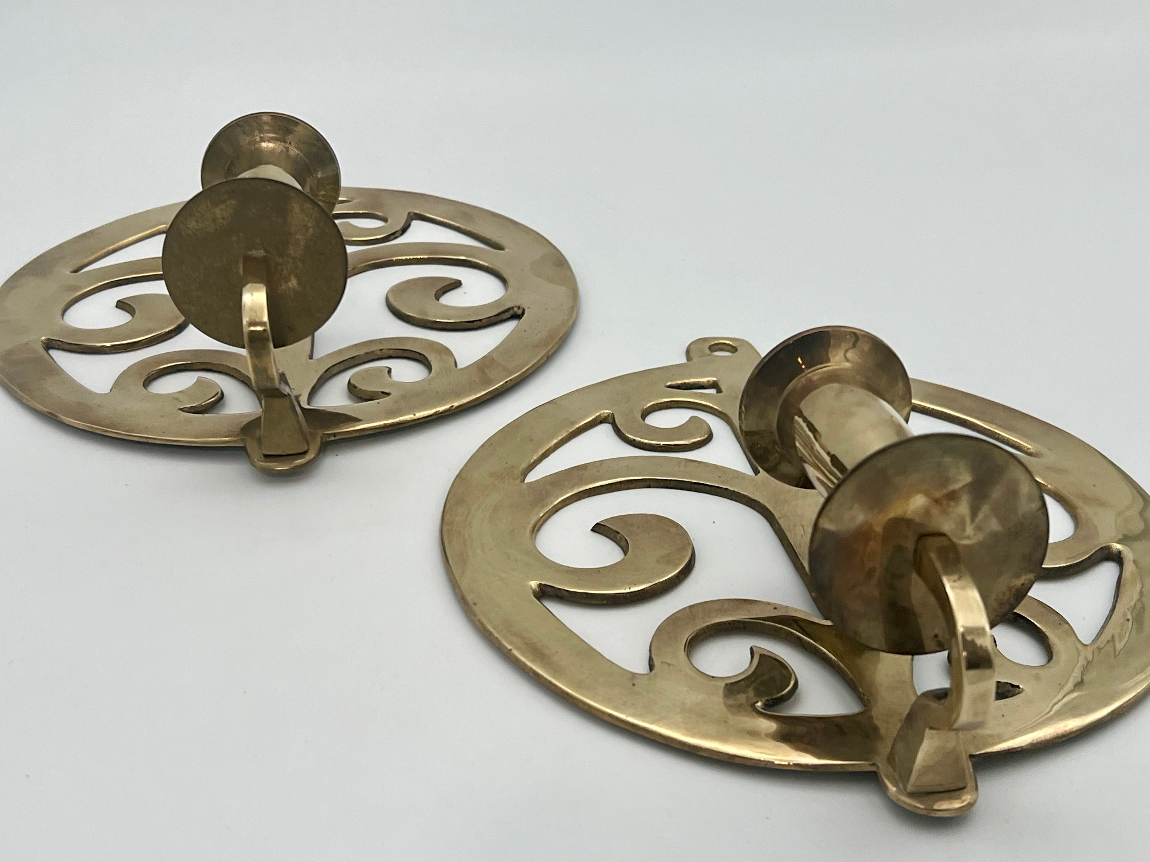PAIR OF VINTAGE BRASS WALL SCONCES WITH SCROLL DESIGN