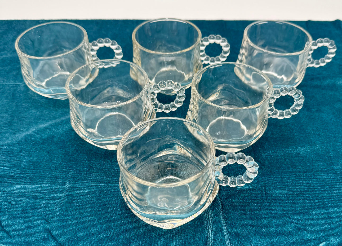 1940s HAZEL ATLAS ORCHARD CRYSTAL GLASS PUNCH CUPS WITH BEADED HANDLES, SET OF 7