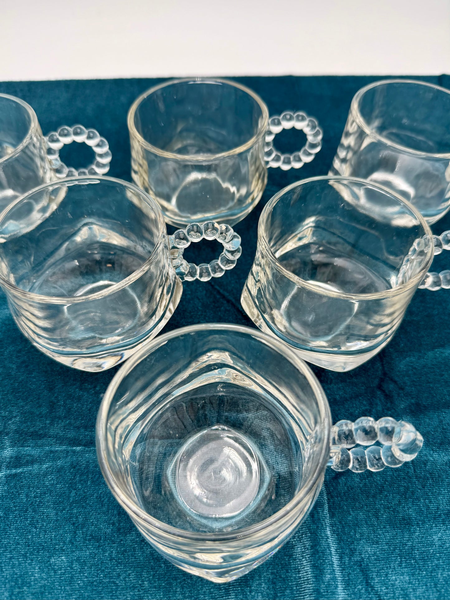 1940s HAZEL ATLAS ORCHARD CRYSTAL GLASS PUNCH CUPS WITH BEADED HANDLES, SET OF 7