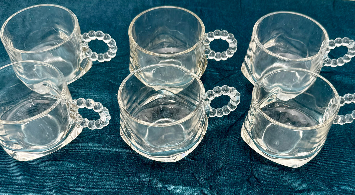 1940s HAZEL ATLAS ORCHARD CRYSTAL GLASS PUNCH CUPS WITH BEADED HANDLES, SET OF 7