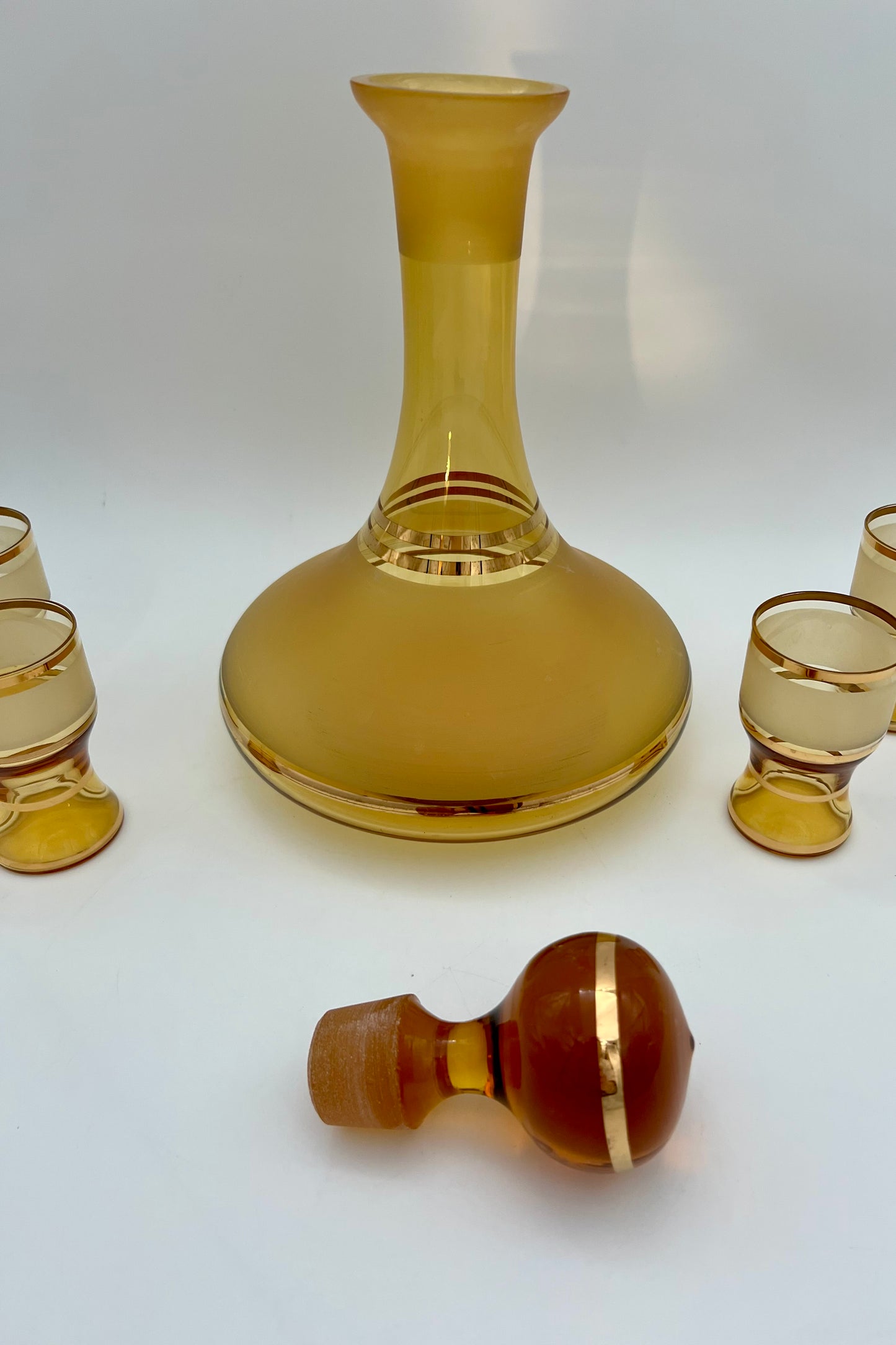 MID CENTURY AMBER AND GOLD CORDIAL LIQUOR DECANTER SET