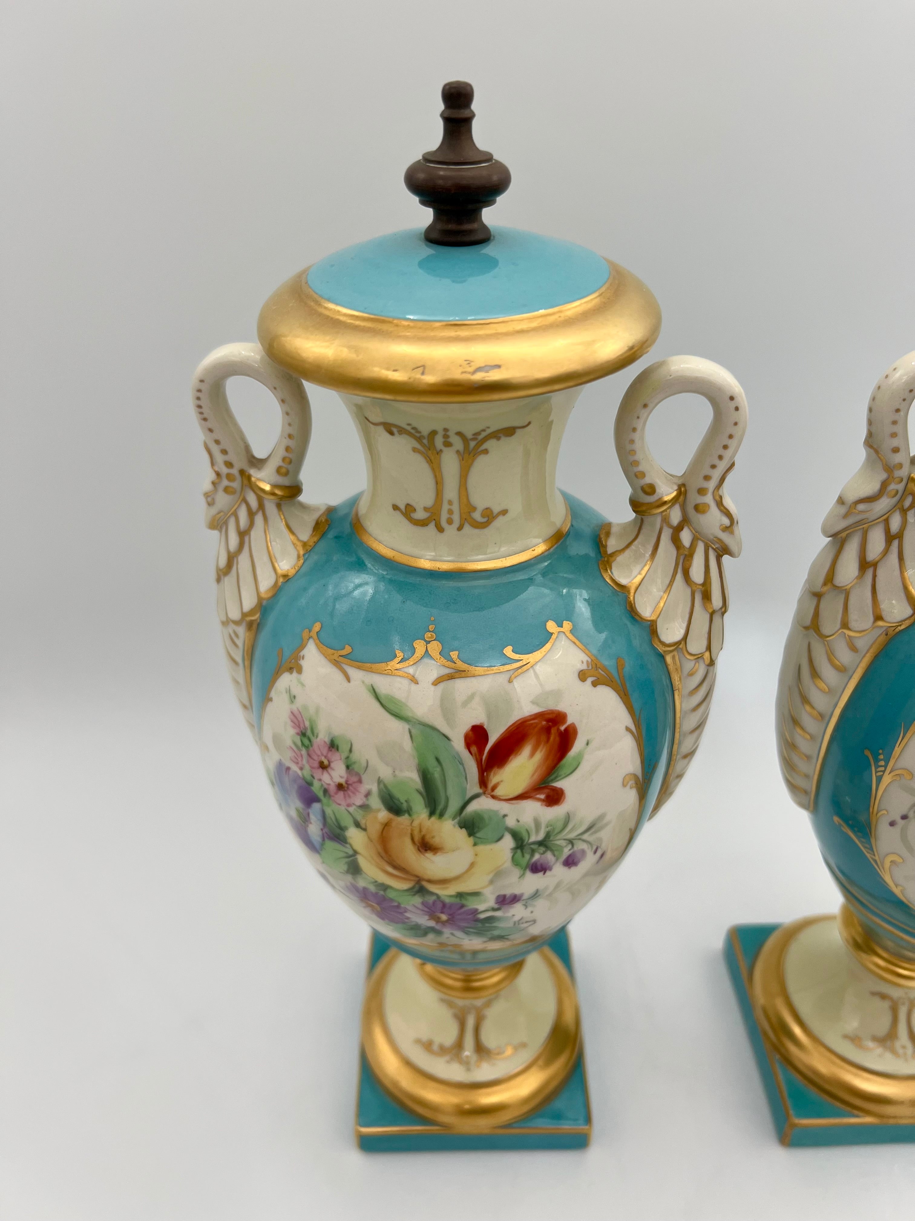 PAIR OF 19TH CENTURY LIMOGES SWAN-HANDLE URN VASES WITH LIDS – TURQUOISE & GOLD OLD PARIS STYLE, HAND-PAINTED FLORAL CARTOUCHES