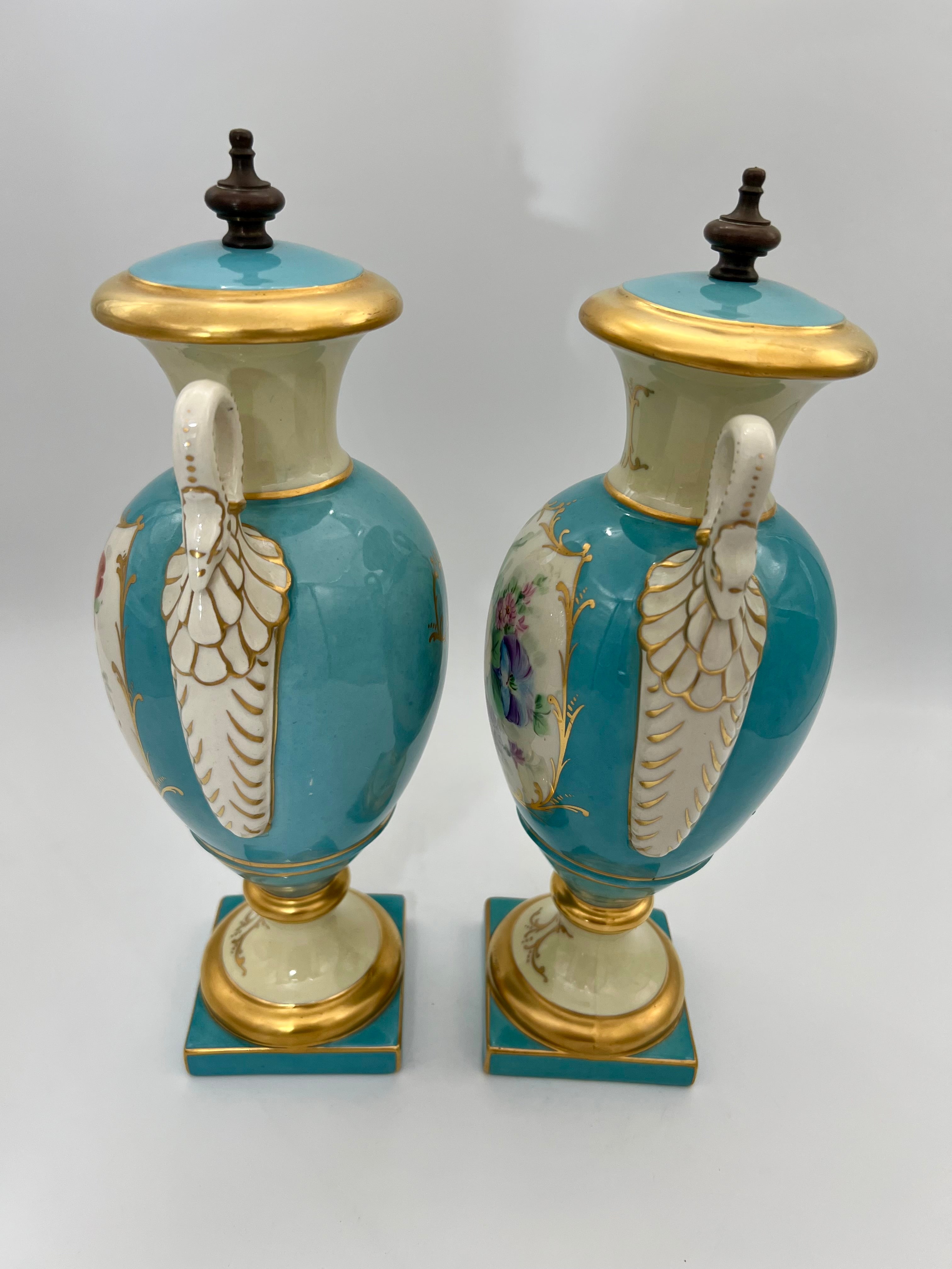 PAIR OF 19TH CENTURY LIMOGES SWAN-HANDLE URN VASES WITH LIDS – TURQUOISE & GOLD OLD PARIS STYLE, HAND-PAINTED FLORAL CARTOUCHES