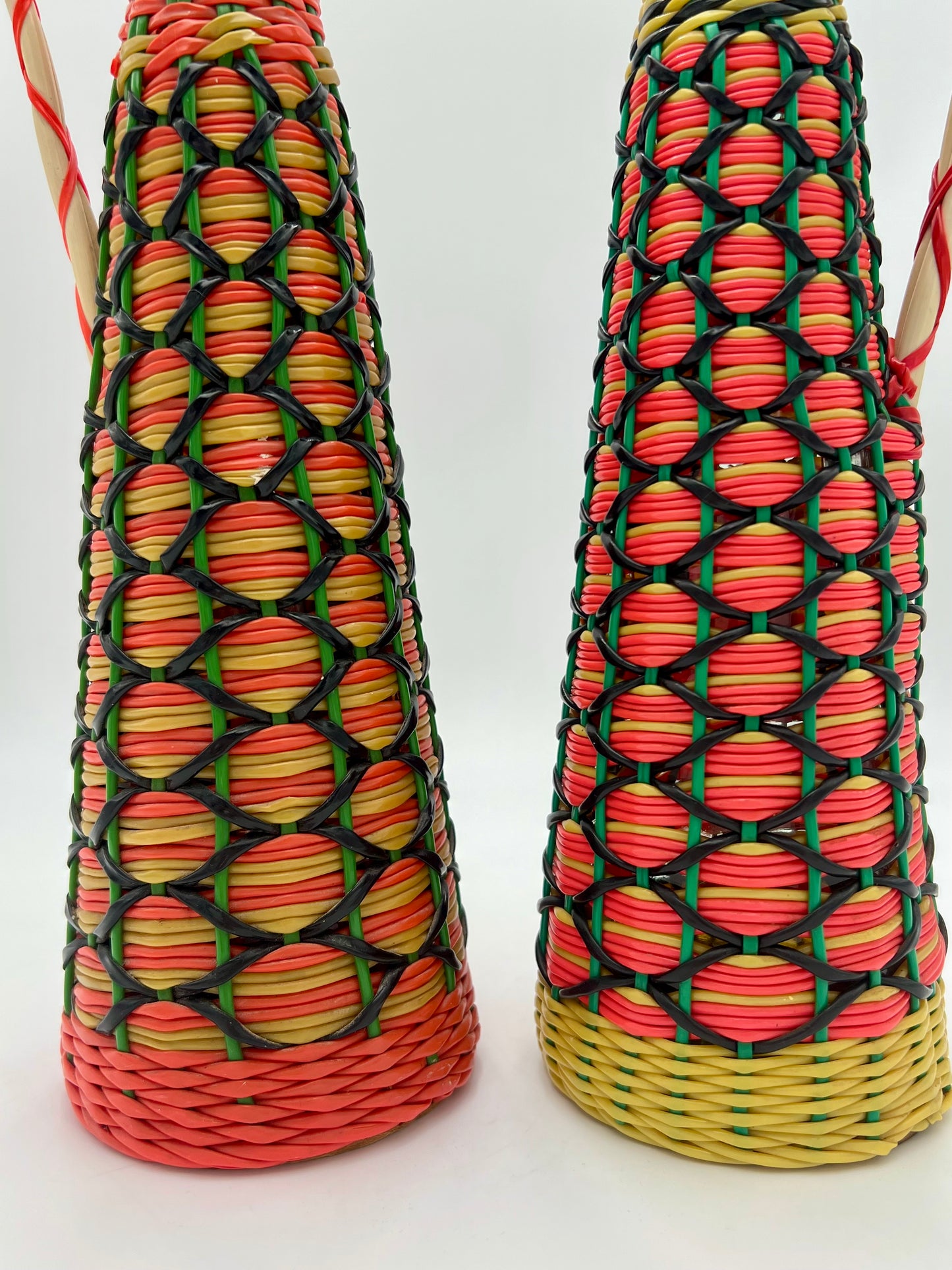 PAIR OF 1960s BOHO SCOUBIDOU WOVEN PLASTIC GLASS BOTTLE DECANTER, SPAIN