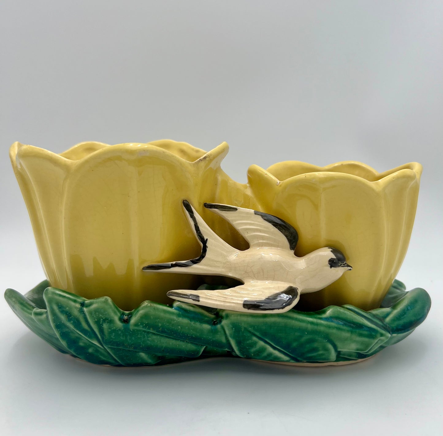 MCCOY POTTERY DOUBLE YELLOW TULIP PLANTER WITH A SWALLOW, CIRCA 1948