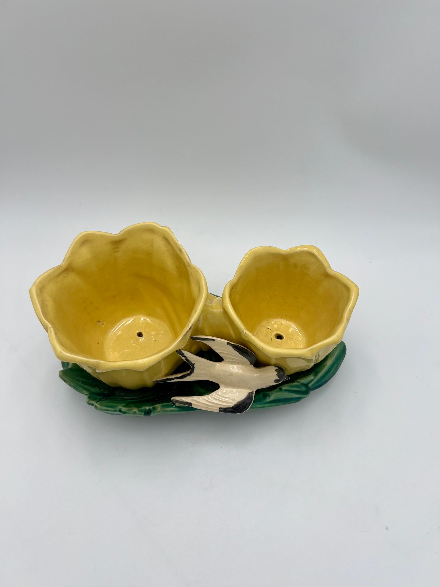 MCCOY POTTERY DOUBLE YELLOW TULIP PLANTER WITH A SWALLOW, CIRCA 1948