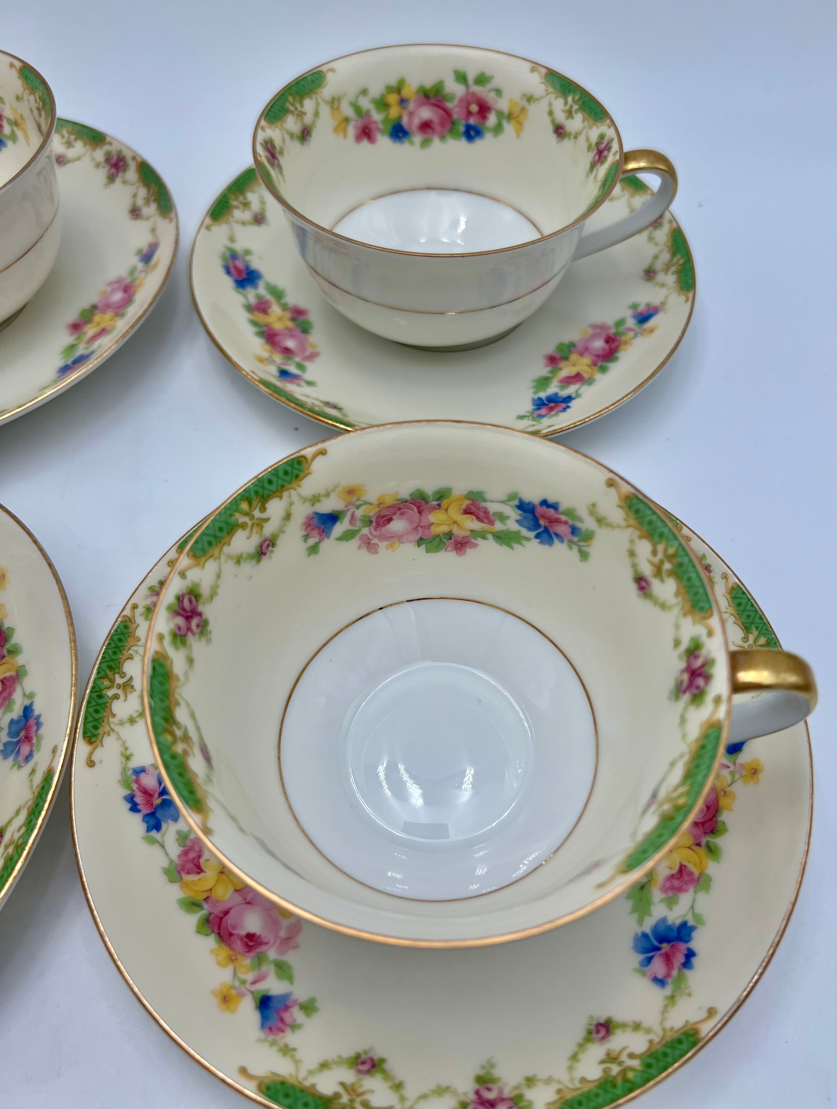 VINTAGE CZECHOSLOVAKIA FLORAL TEACUPS AND SAUCERS SET OF 4 WITH GOLD TRIM