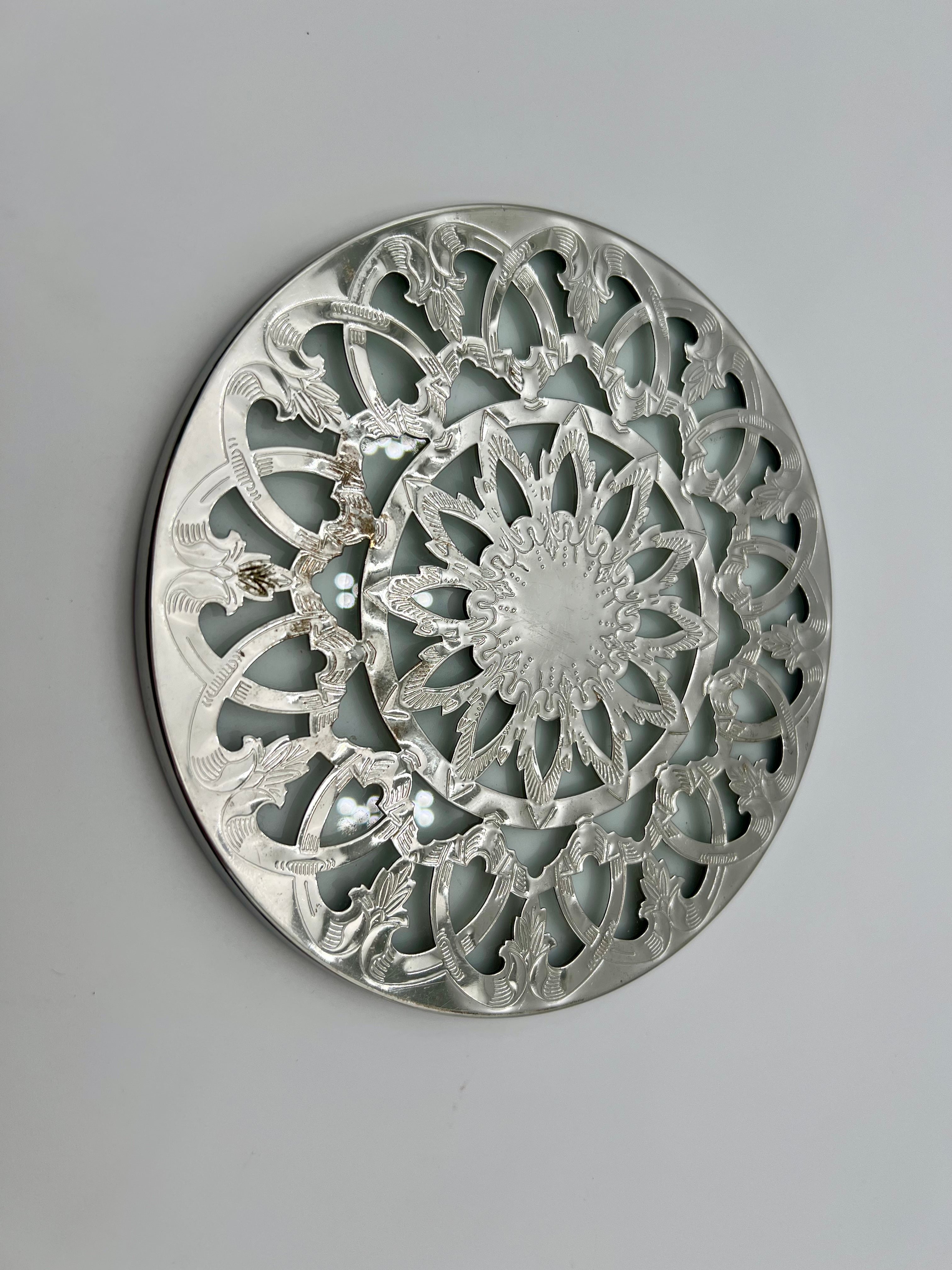 VINTAGE GLASS-BACKED SILVER-PLATE TRIVET — PIERCED FLORAL DESIGN, LIKELY SPANISH, MID-CENTURY
