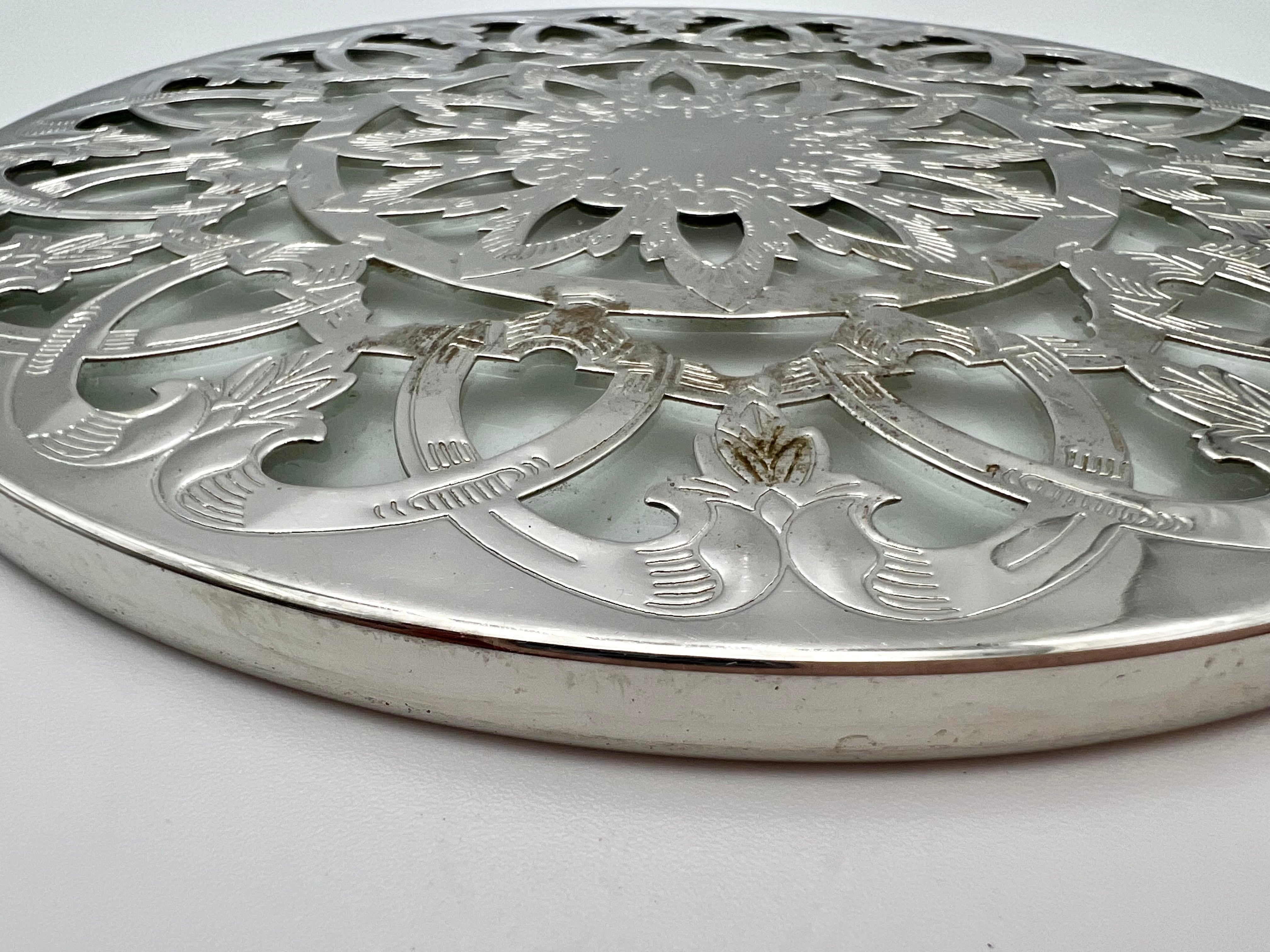 VINTAGE GLASS-BACKED SILVER-PLATE TRIVET — PIERCED FLORAL DESIGN, LIKELY SPANISH, MID-CENTURY