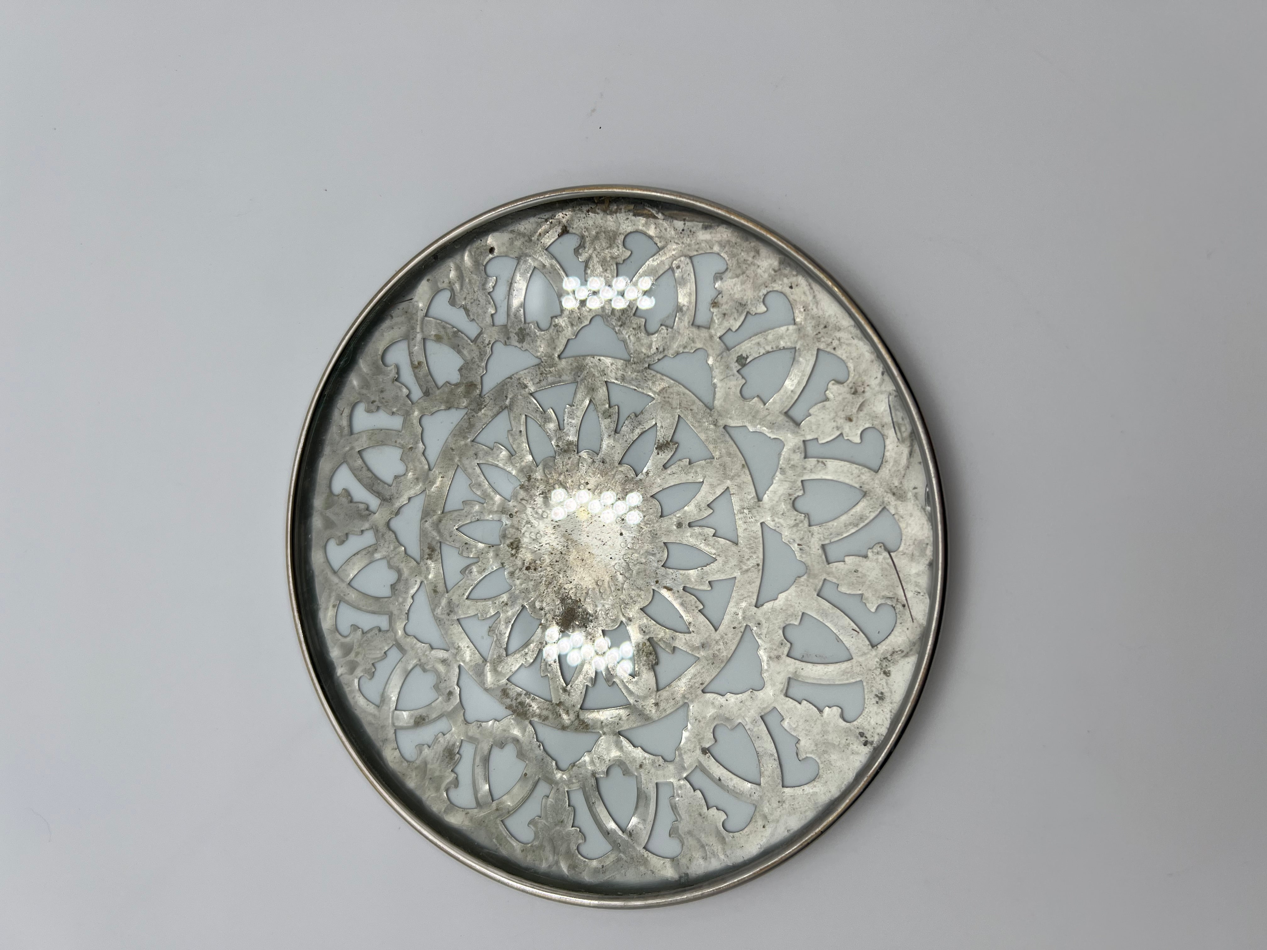 VINTAGE GLASS-BACKED SILVER-PLATE TRIVET — PIERCED FLORAL DESIGN, LIKELY SPANISH, MID-CENTURY