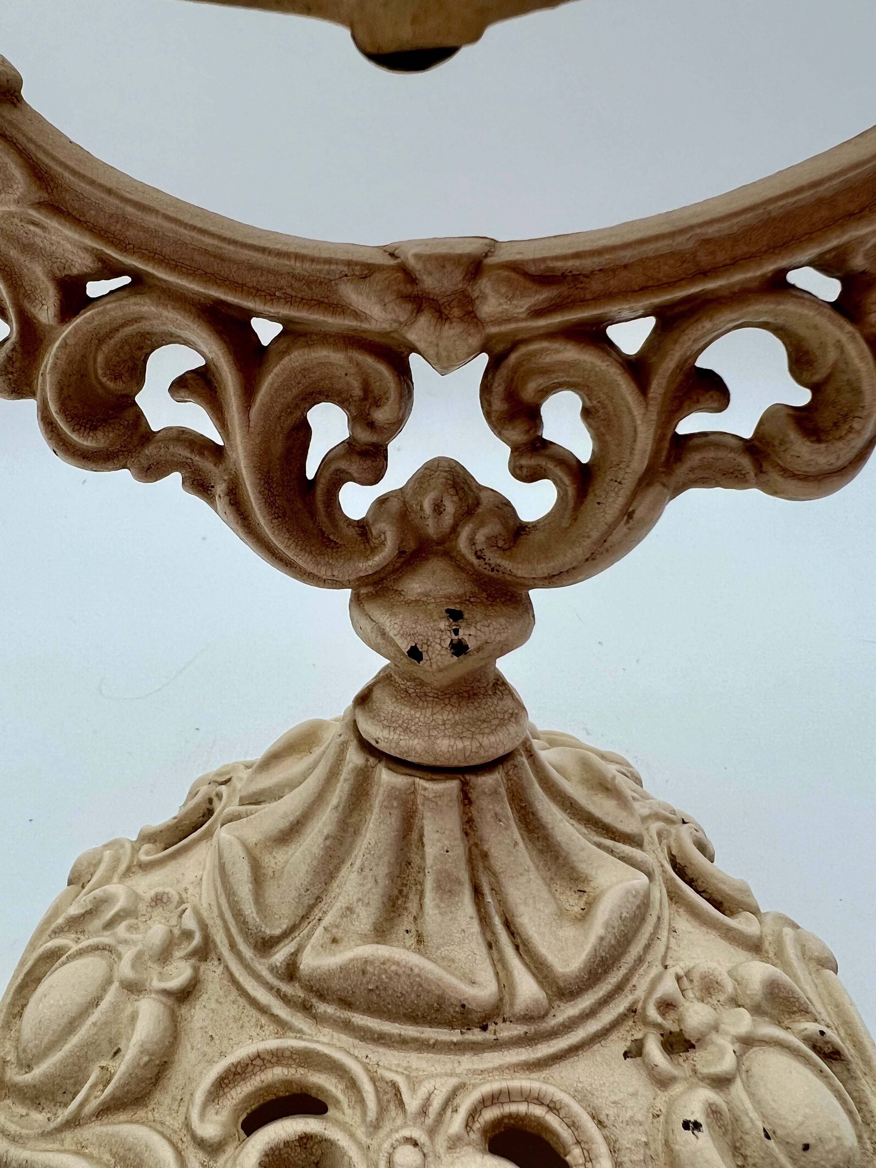 ANTIQUE VANITY TABLE MIRROR WITH DOG HEAD HANDLES & PUTTO CHERUB – ORNATE CAST IRON – 14 ¾ INCH – CIRCA EARLY 1900s