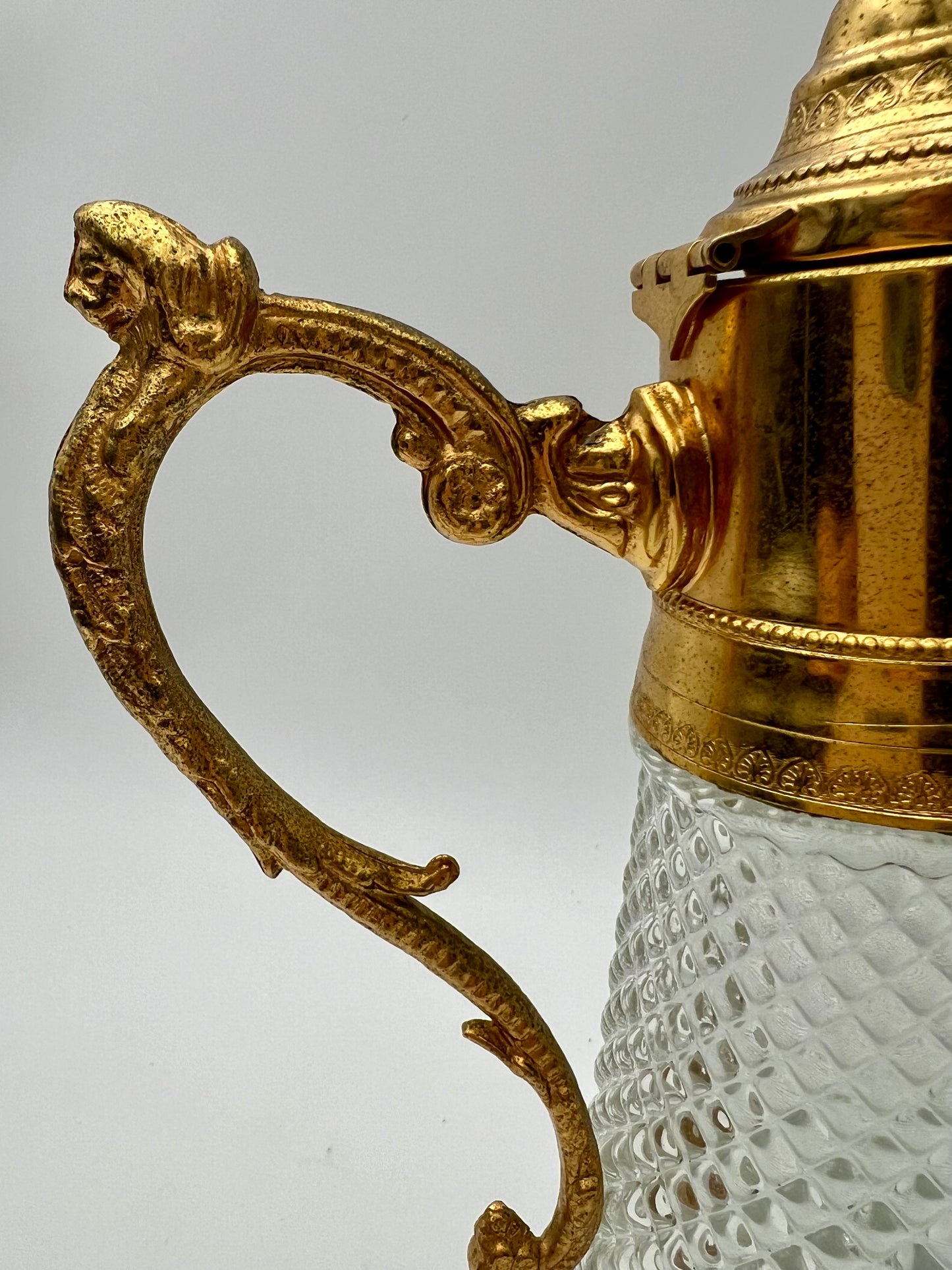 ANTIQUE ART DECO DIAMOND TIP CRYSTAL  AND GILT LION HEAD HANDLE JUG, CIRCA  1930’S