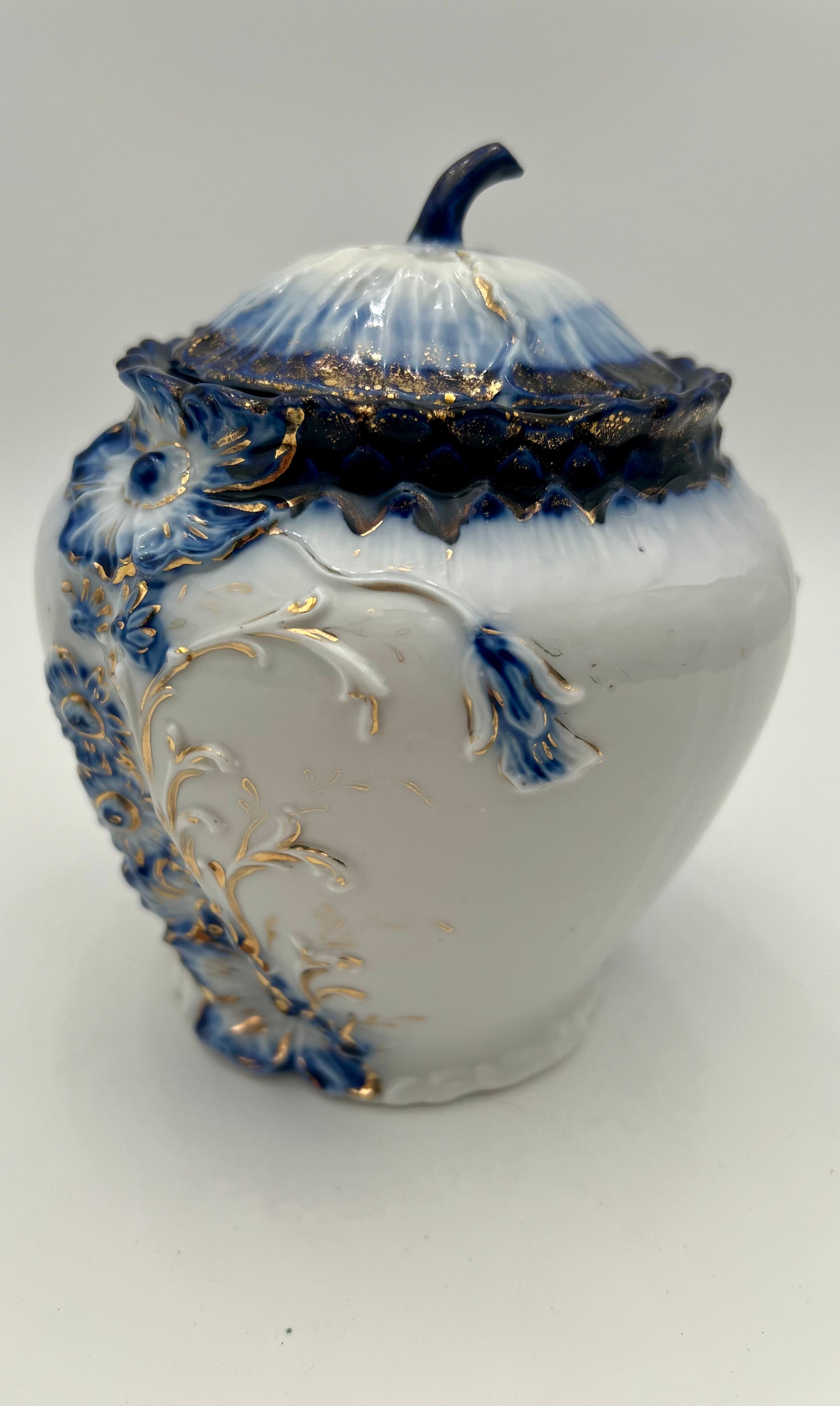 ANTIQUE COBALT BLUE & GOLD GILT PORCELAIN BISCUIT JAR WITH FLORAL RELIEF