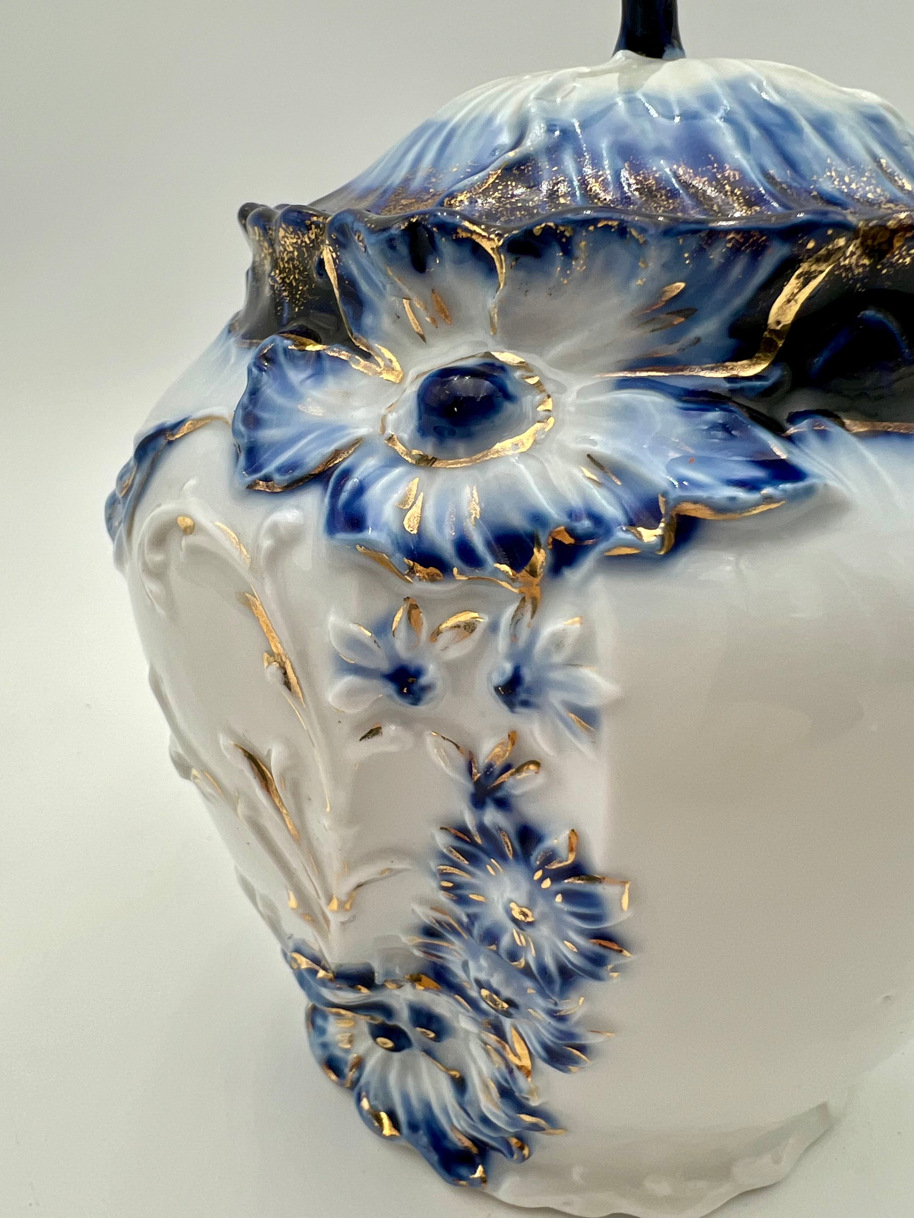 ANTIQUE COBALT BLUE & GOLD GILT PORCELAIN BISCUIT JAR WITH FLORAL RELIEF