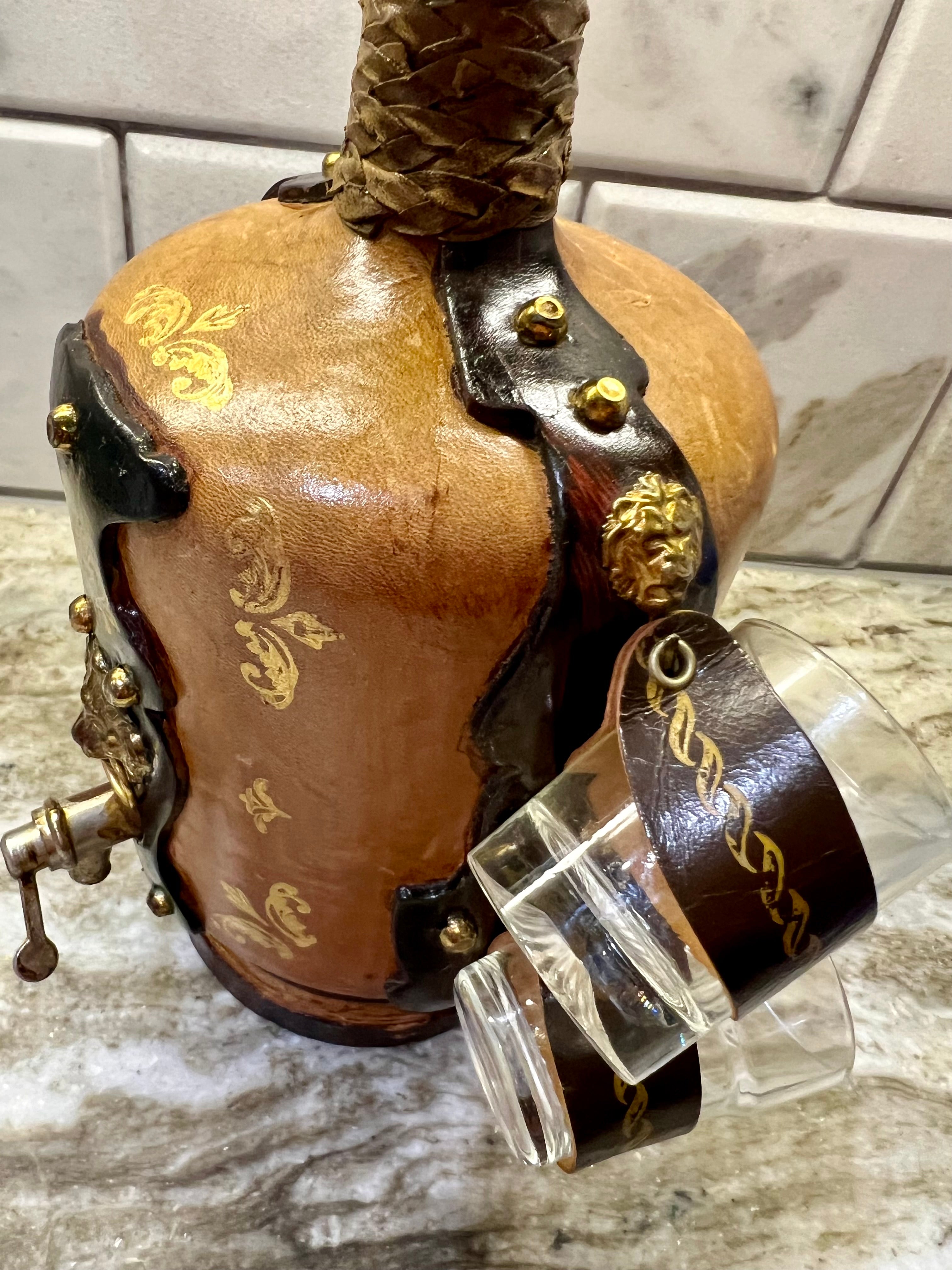 VINTAGE ITALIAN LEATHER-WRAPPED DECANTER SET WITH LION SPIGOT