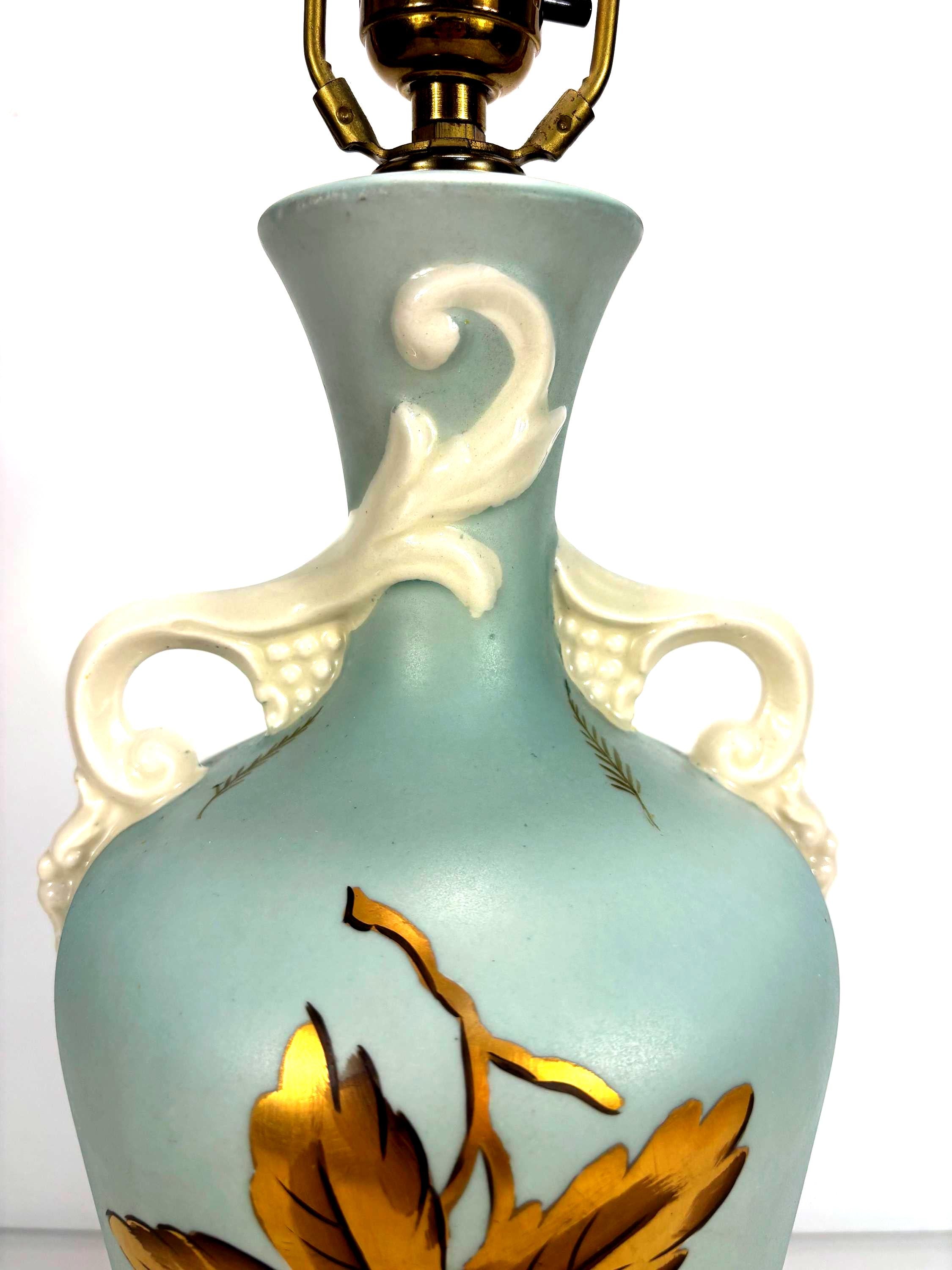 MID CENTURY CELADON BLUE ART POTTERY TABLE LAMP WITH GOLD LEAF BOTANICAL MOTIF | HOLLYWOOD REGENCY SCULPTURAL URN LAMP, 1950s