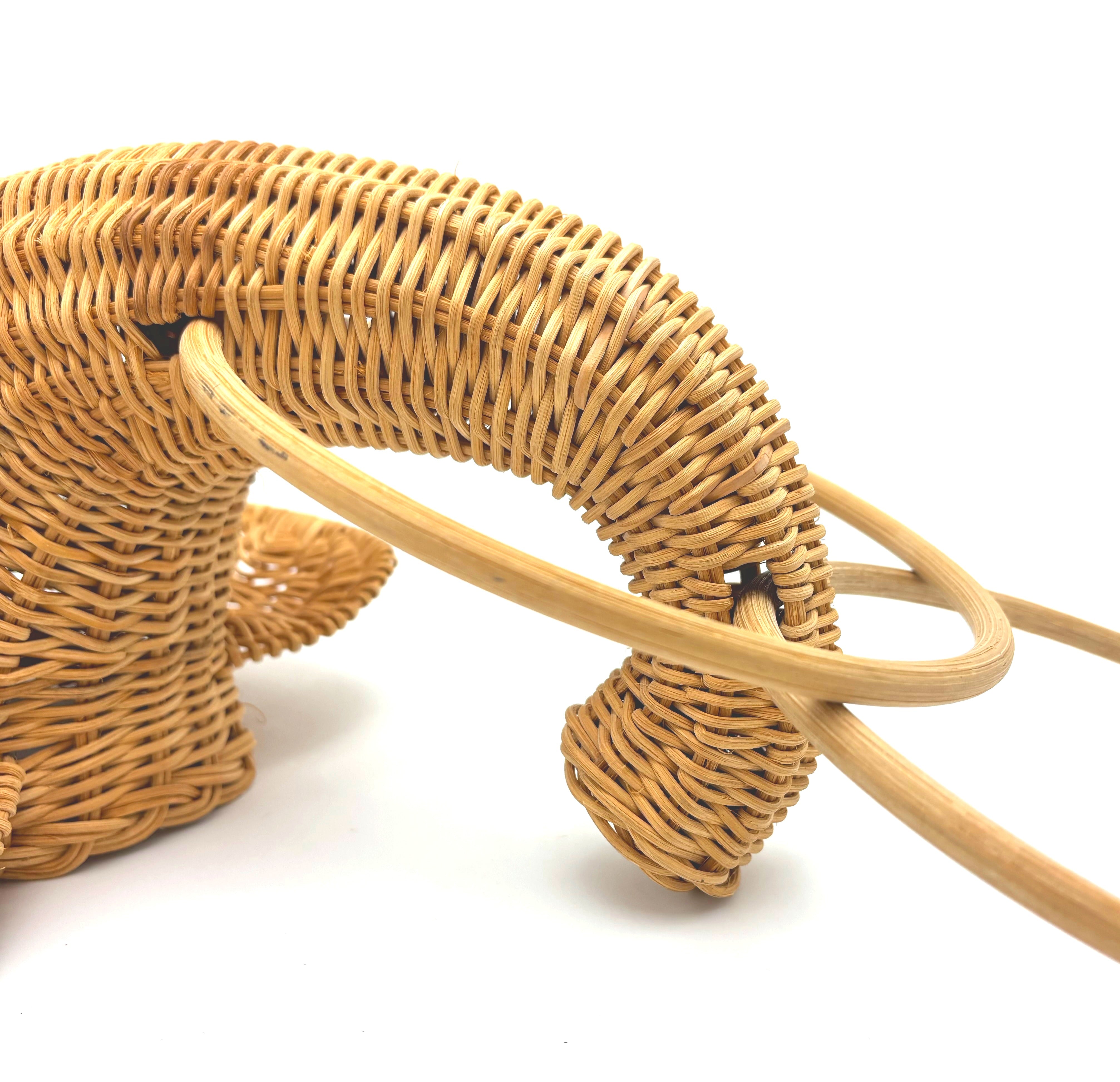 VINTAGE WICKER ELEPHANT TOWEL RINGS