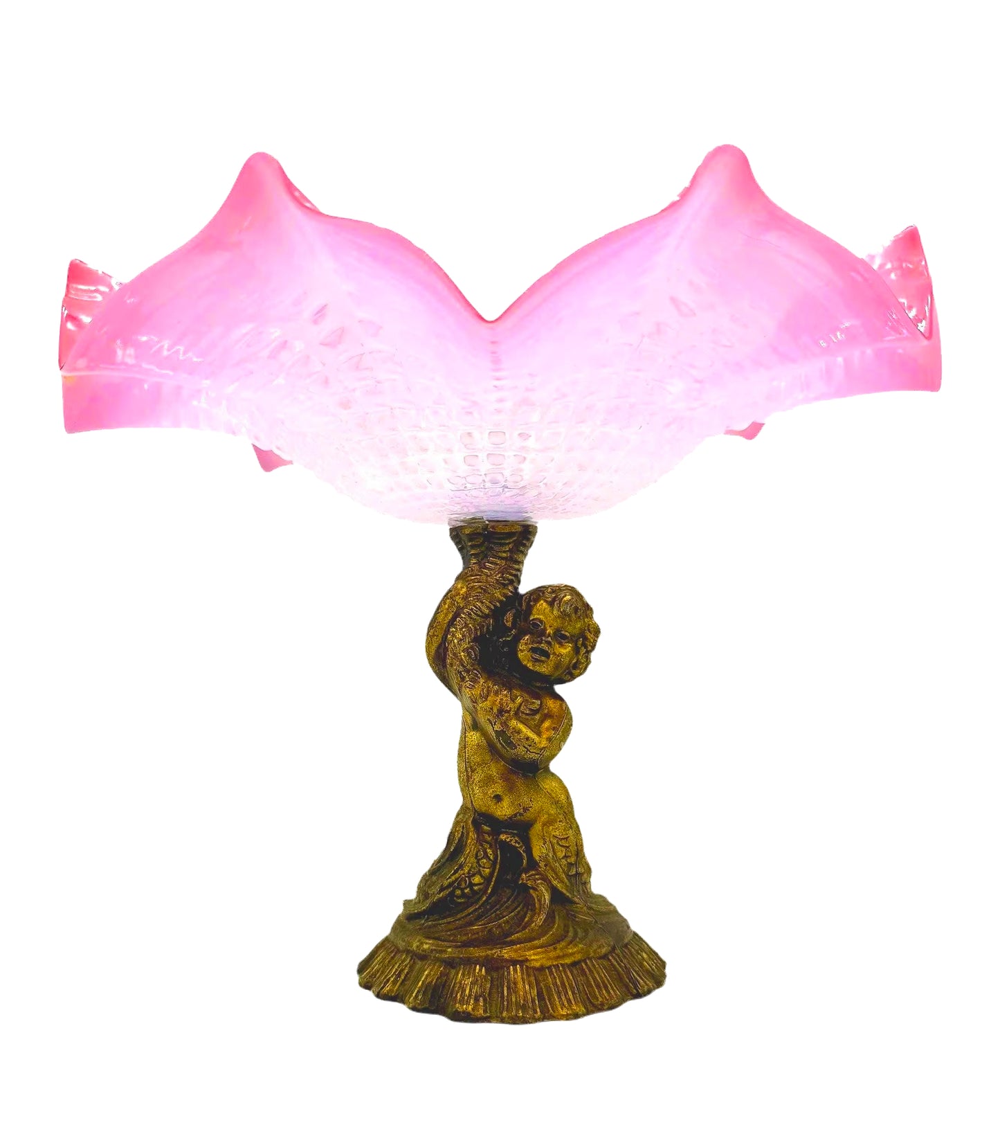 Large Victorian-era cranberry art glass compote with a ruffled edge and an ornate cherub-themed base.