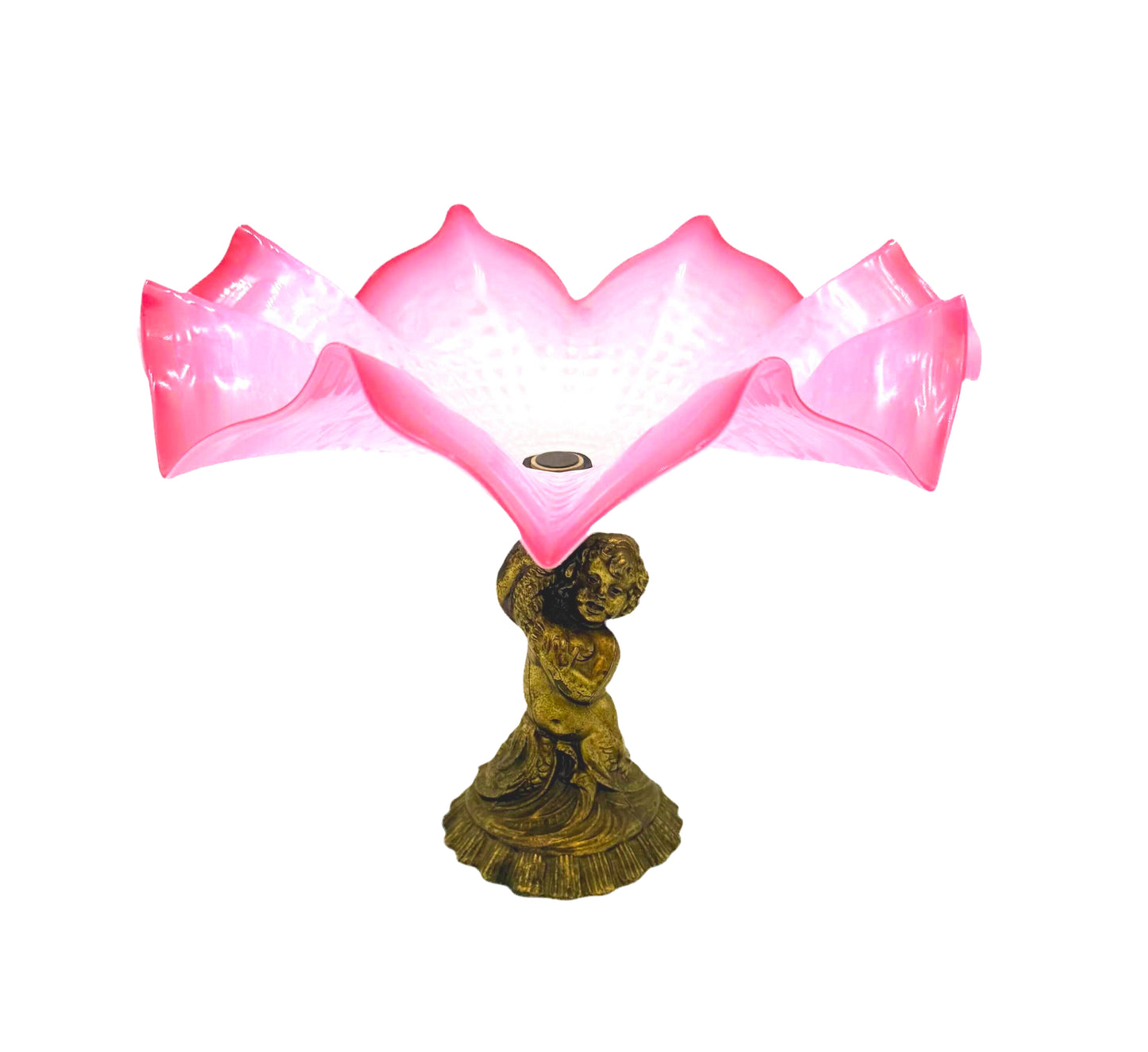 Large Victorian-era cranberry art glass compote with a ruffled edge and an ornate cherub-themed base.