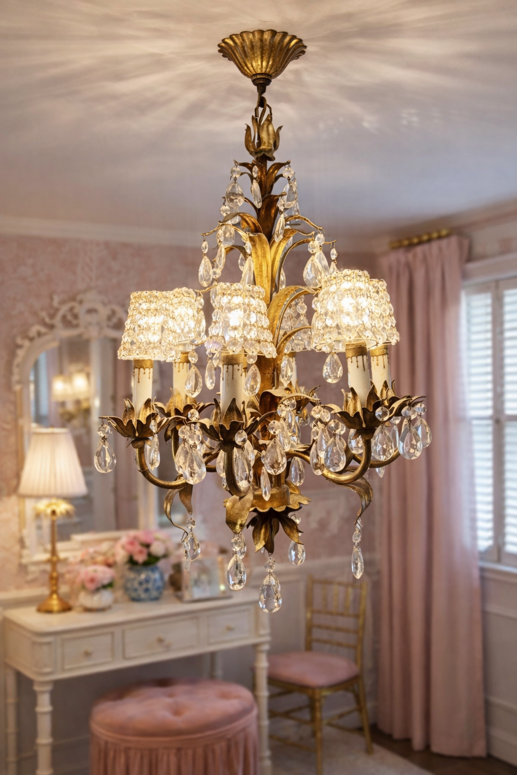 24-inch Italian Hollywood Regency chandelier with gilt floral tole metal and crystal basket shades.