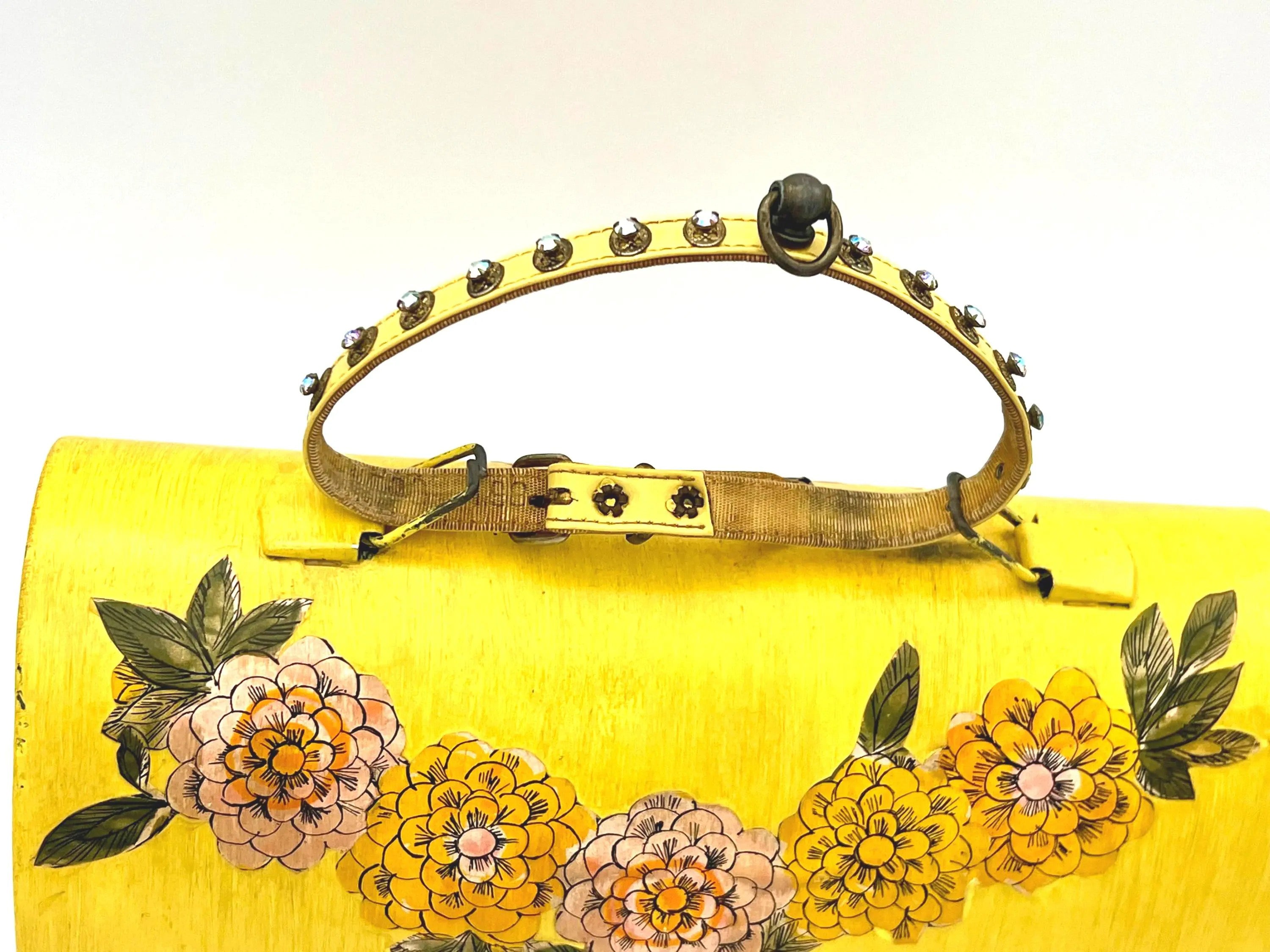 Unique 1960s folk art lunch box converted into a purse with colorful decoupage floral patterns.