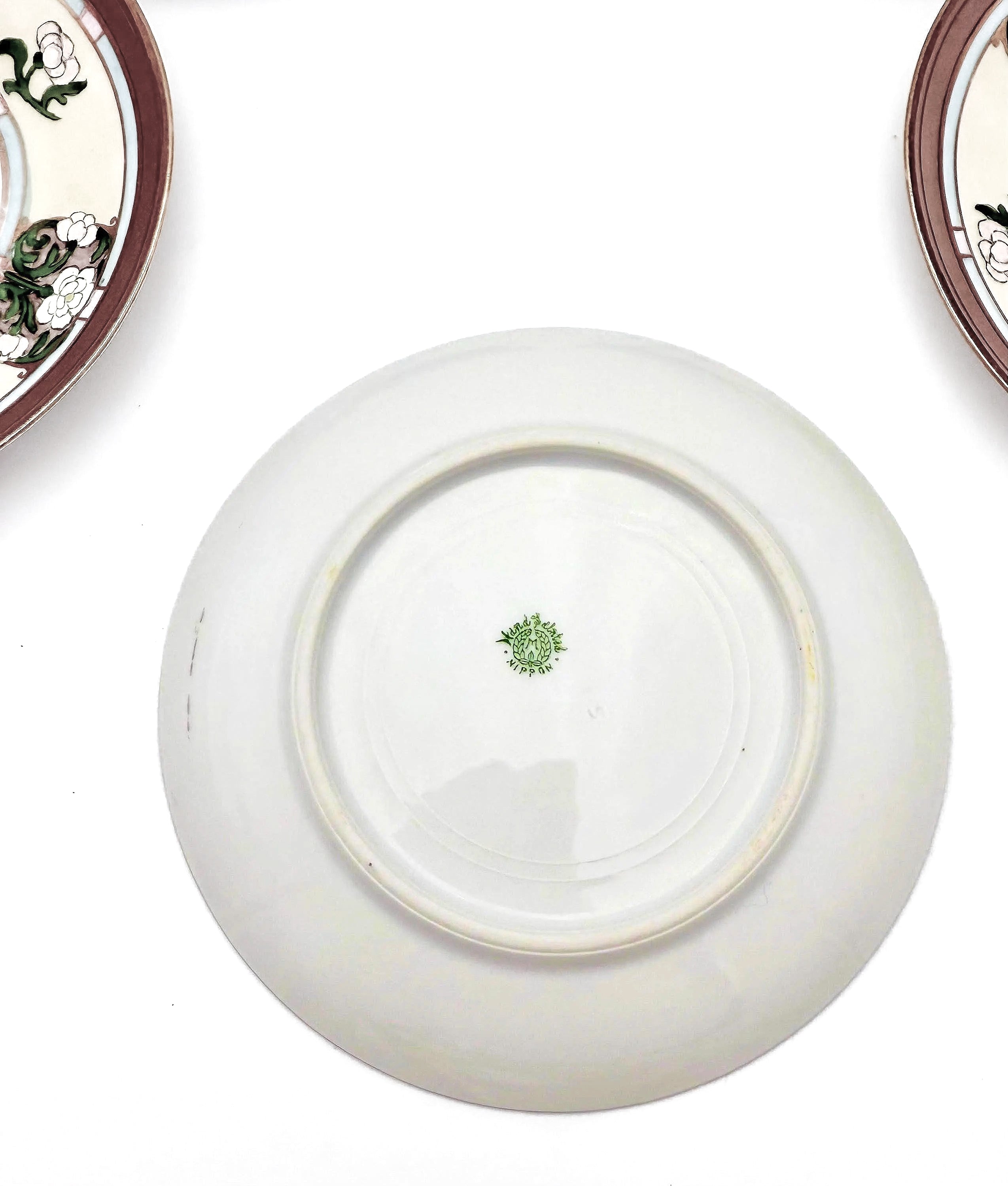 Set of 5 antique Morimura Nippon bread and butter plates with delicate hand-painted floral borders.