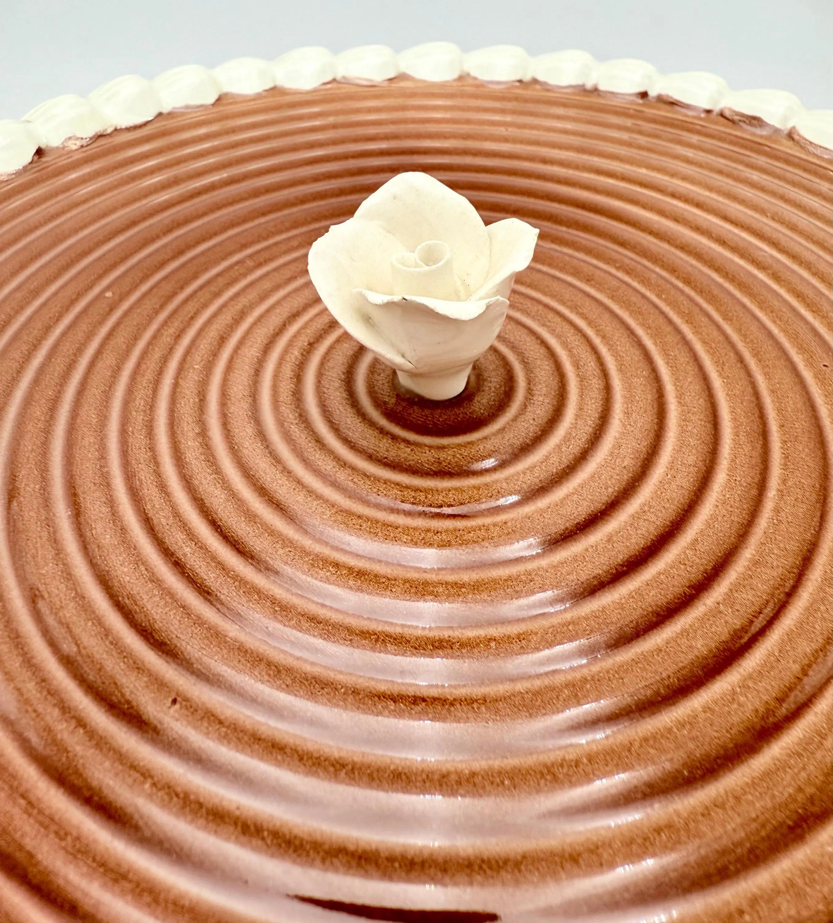 Vintage Portuguese ceramic cake dome and serving platter featuring a handcrafted rose finial on the lid.