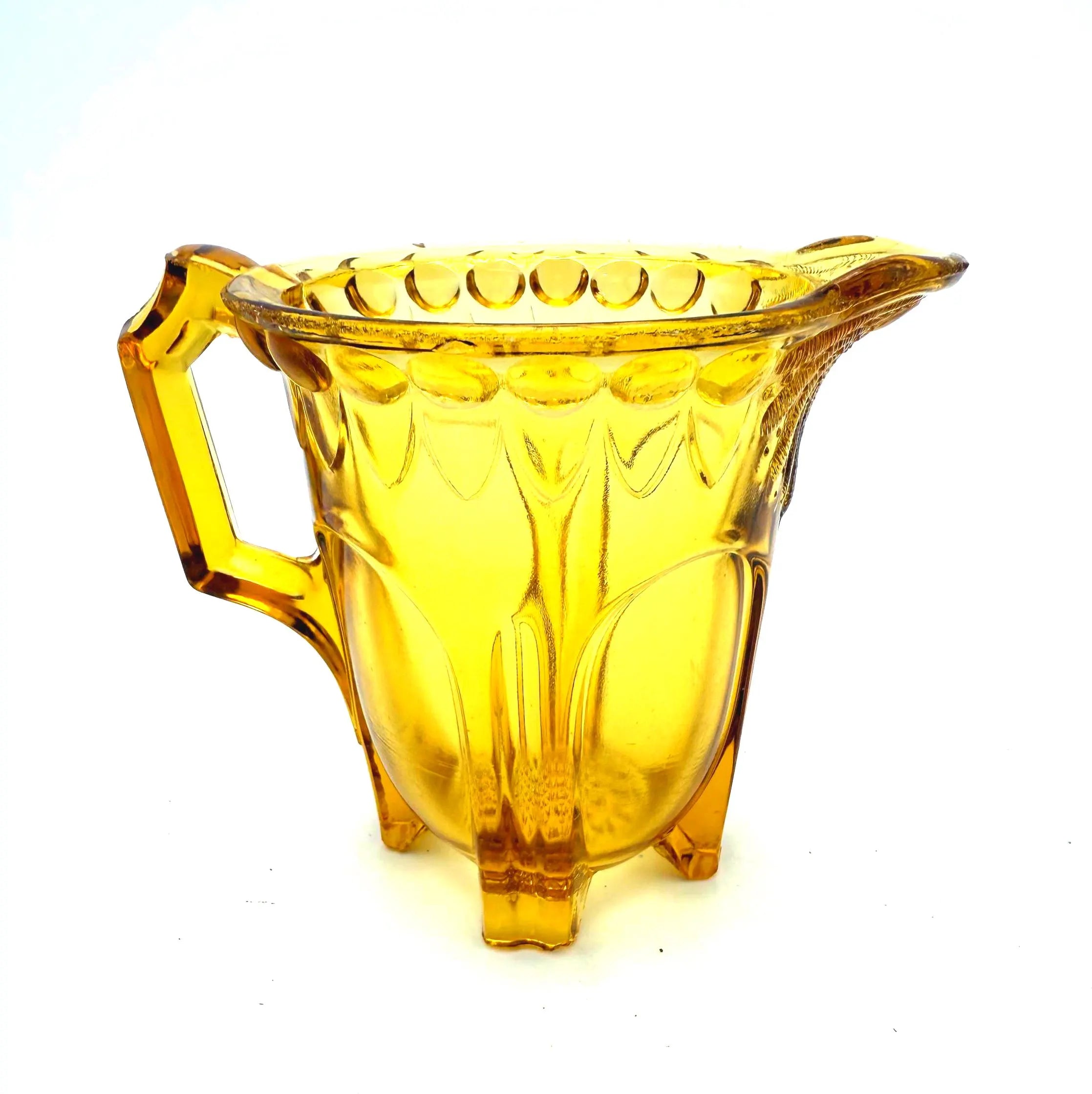 VINTAGE AMBER DEPRESSION GLASS FOOTED CREAMER PITCHER WITH SCALLOPED RIM – ART DECO ERA