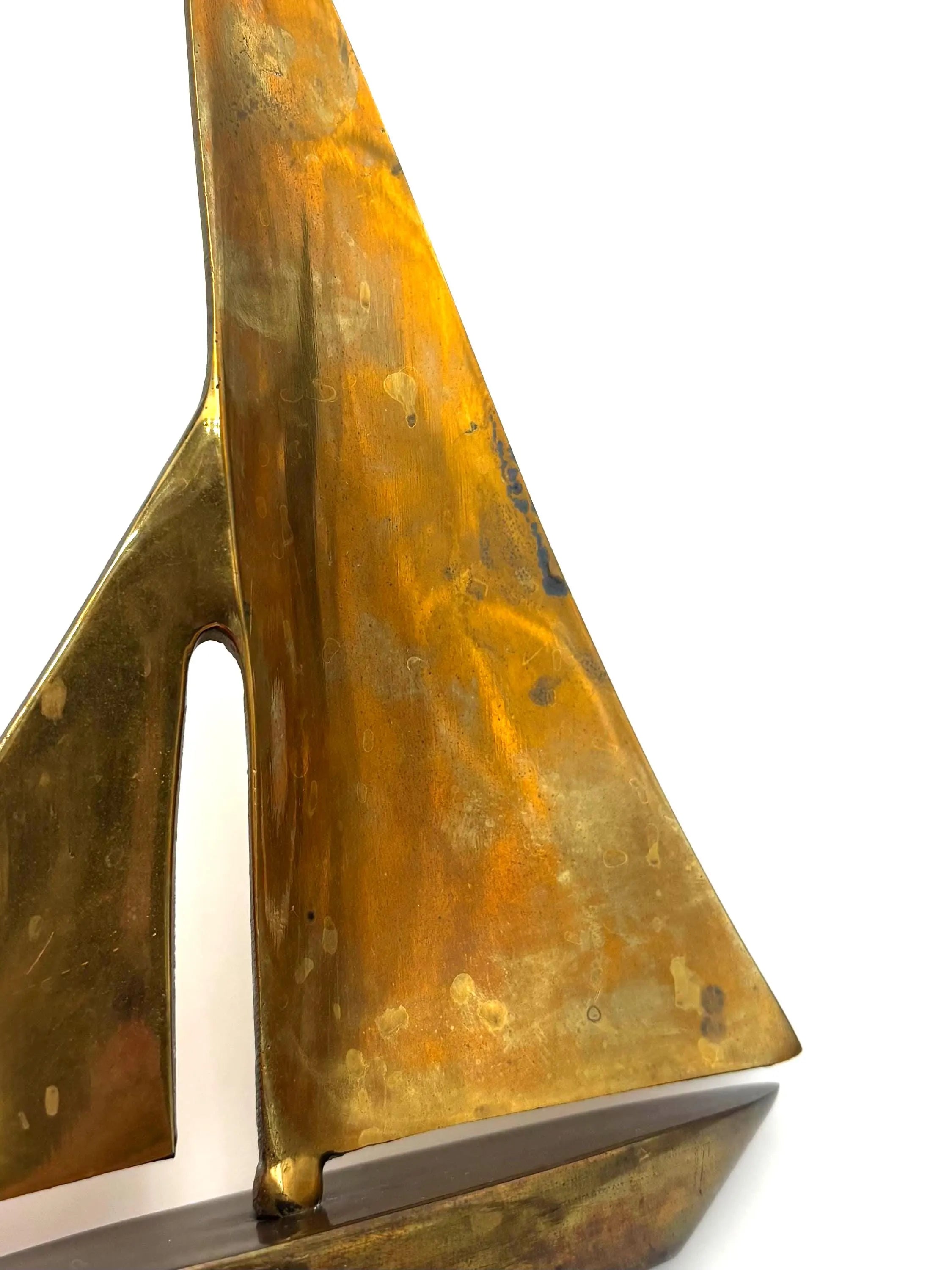 VINTAGE SOLID BRASS SAILBOAT SCULPTURES – COLLECTION OF FOUR MODERNIST YACHTS