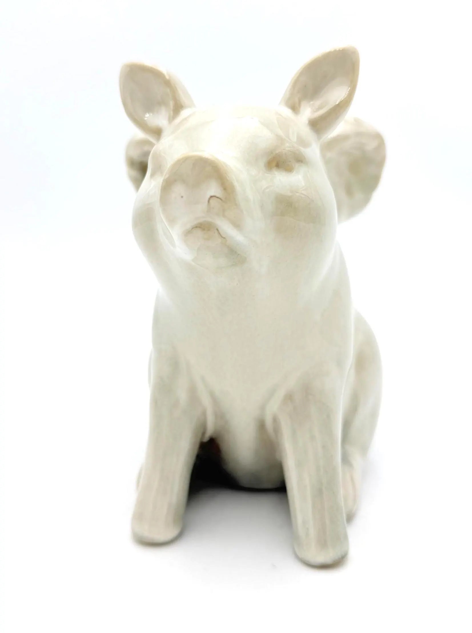 VINTAGE IVORY CERAMIC FLYING PIG FIGURINE
