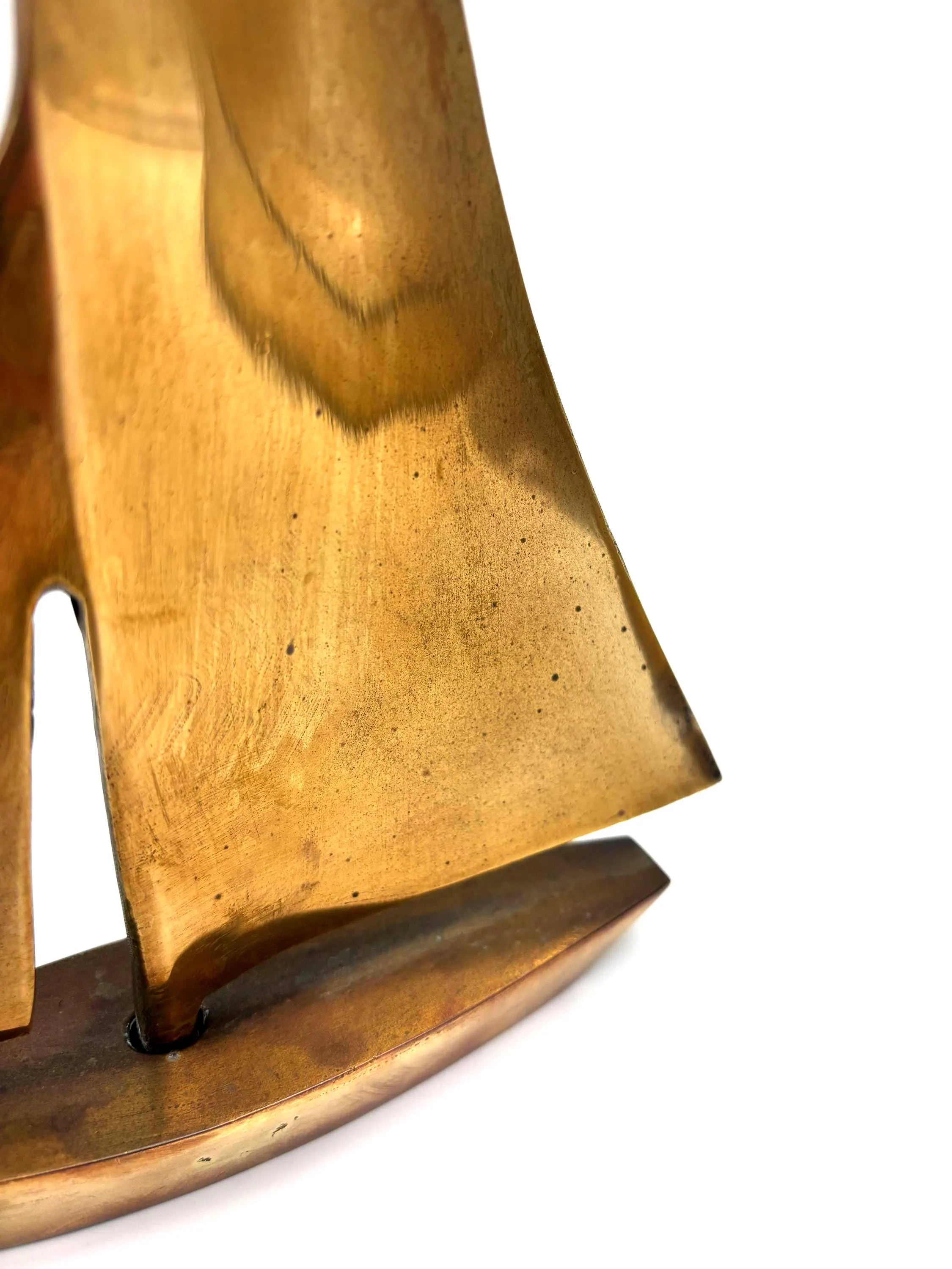 VINTAGE SOLID BRASS SAILBOAT SCULPTURES – COLLECTION OF FOUR MODERNIST YACHTS