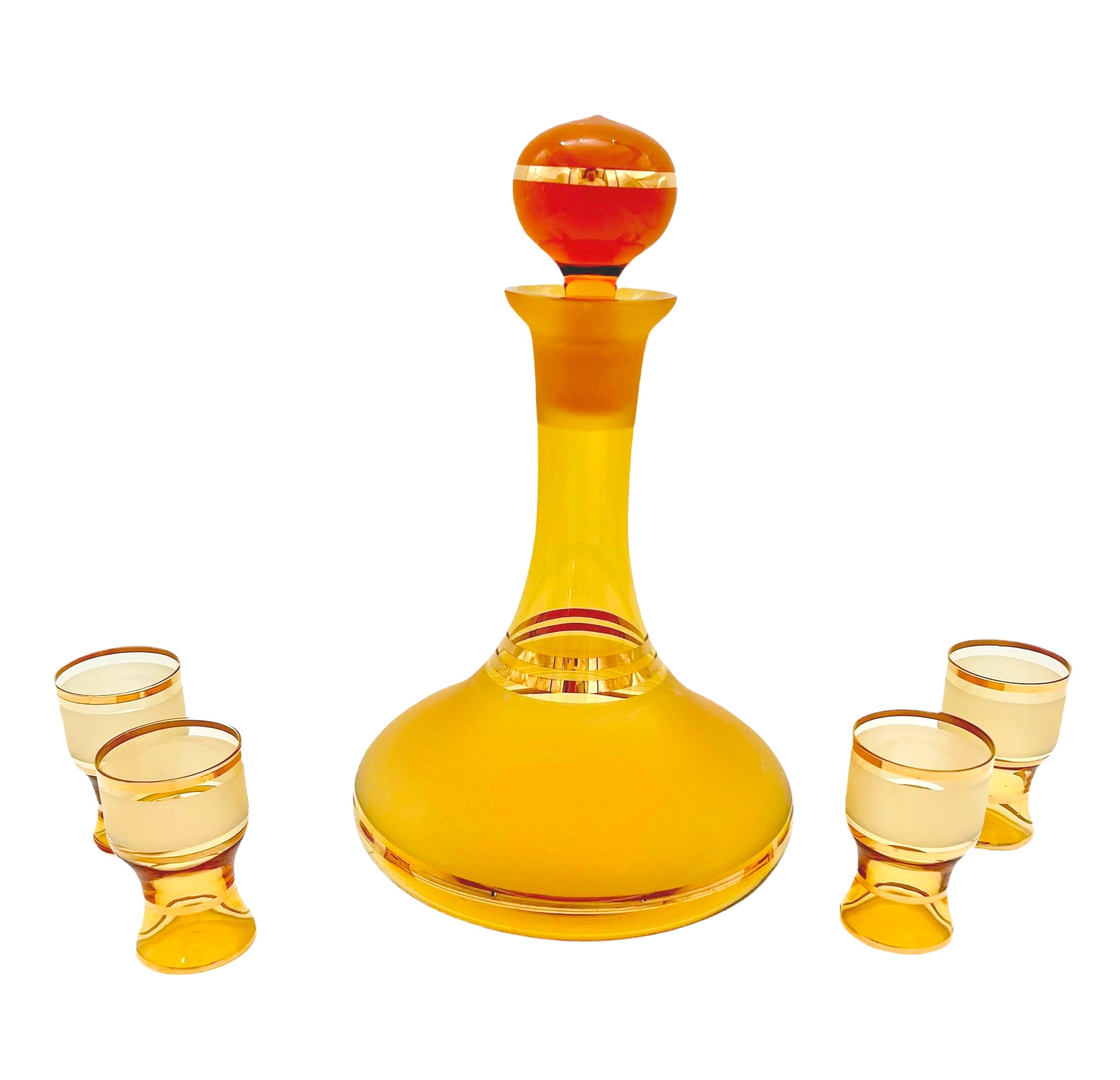 Vintage mid-century cordial set featuring an amber glass decanter with elegant gold filigree accents.