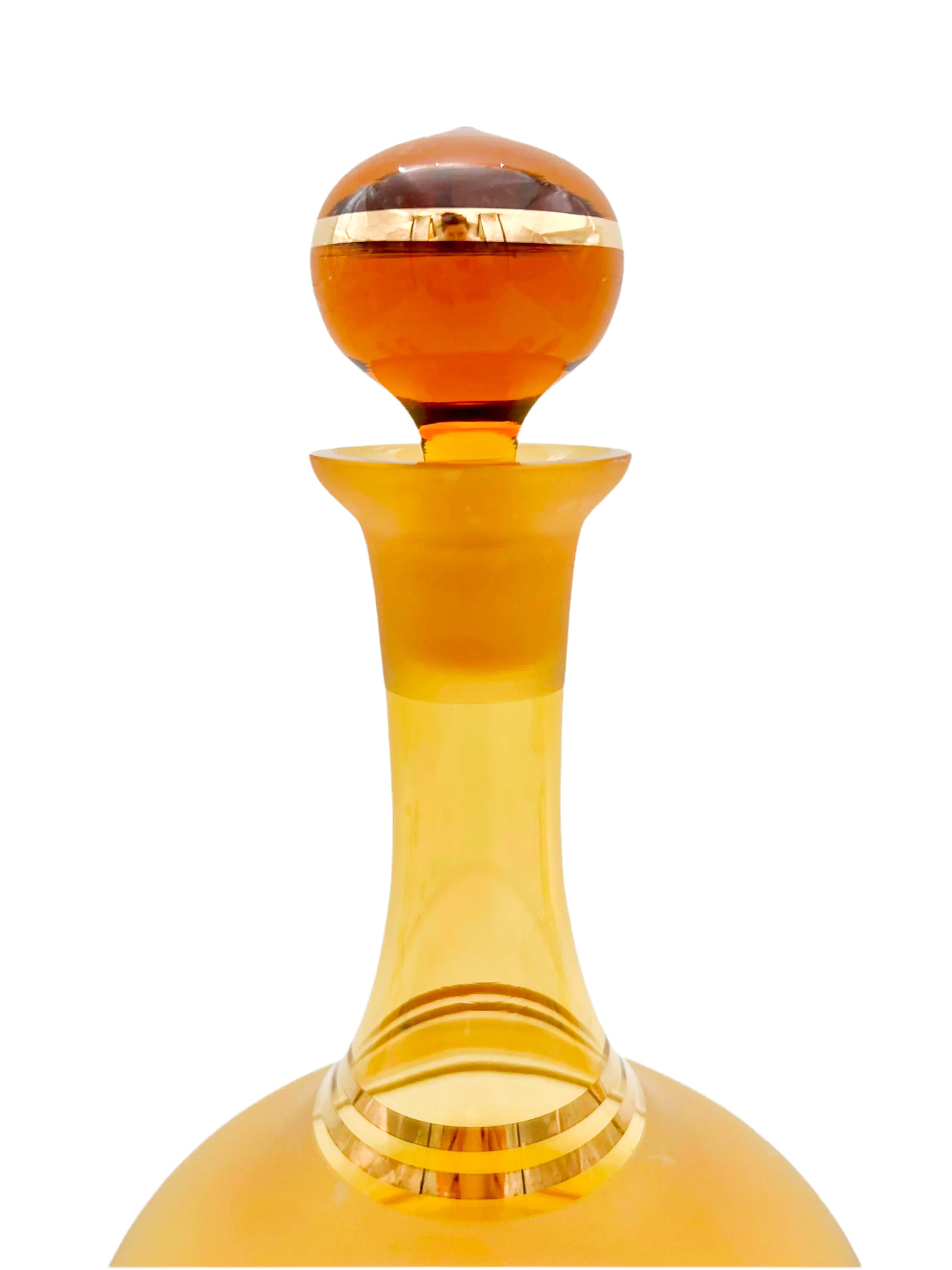 Vintage mid-century cordial set featuring an amber glass decanter with elegant gold filigree accents.