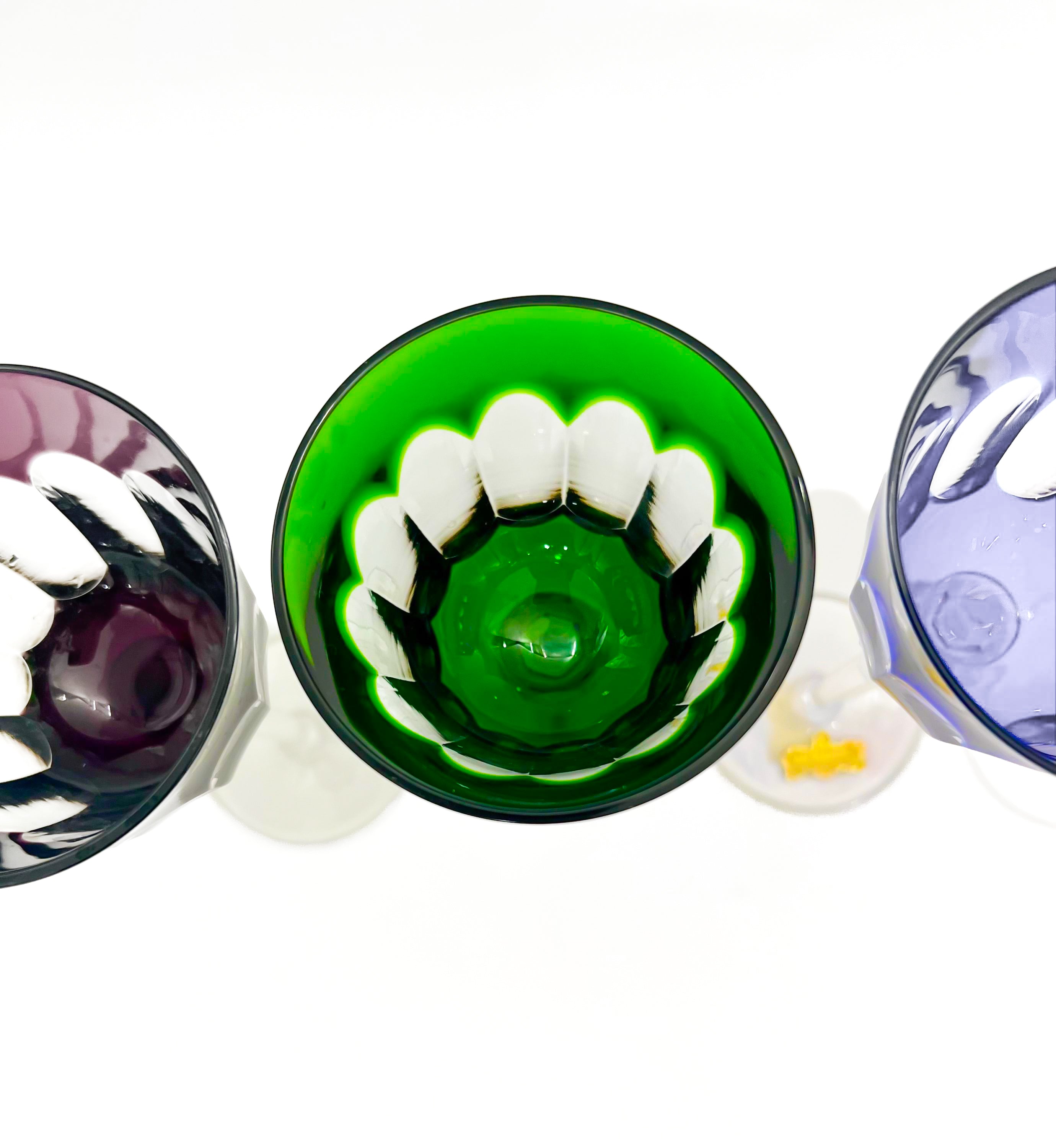 Set of 4 Nachtmann Romer wine glasses in mint condition with colorful cut-to-clear bowls and faceted stems.