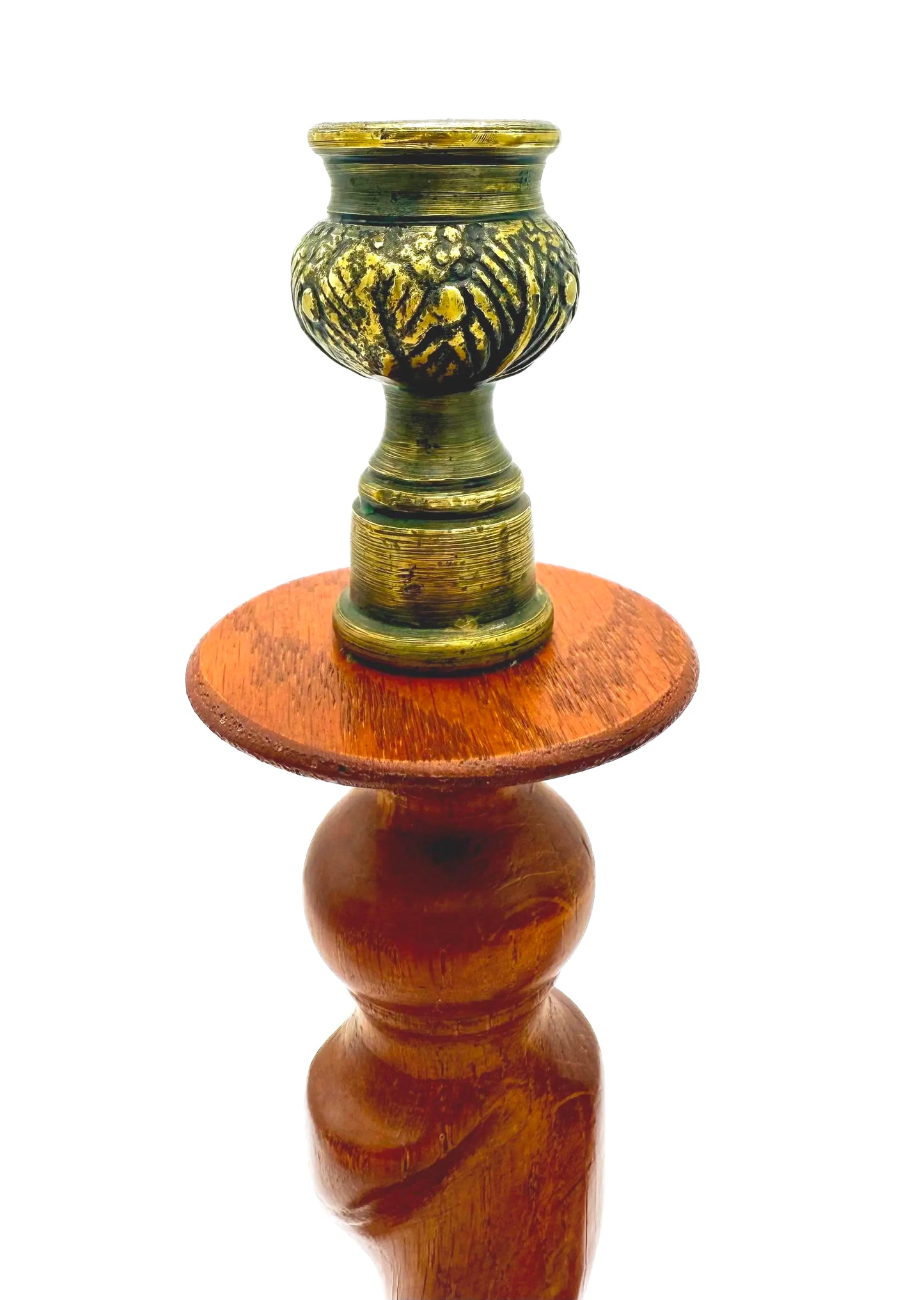 Antique English wooden barley twist candlesticks topped with aged brass thistle-shaped cups.
