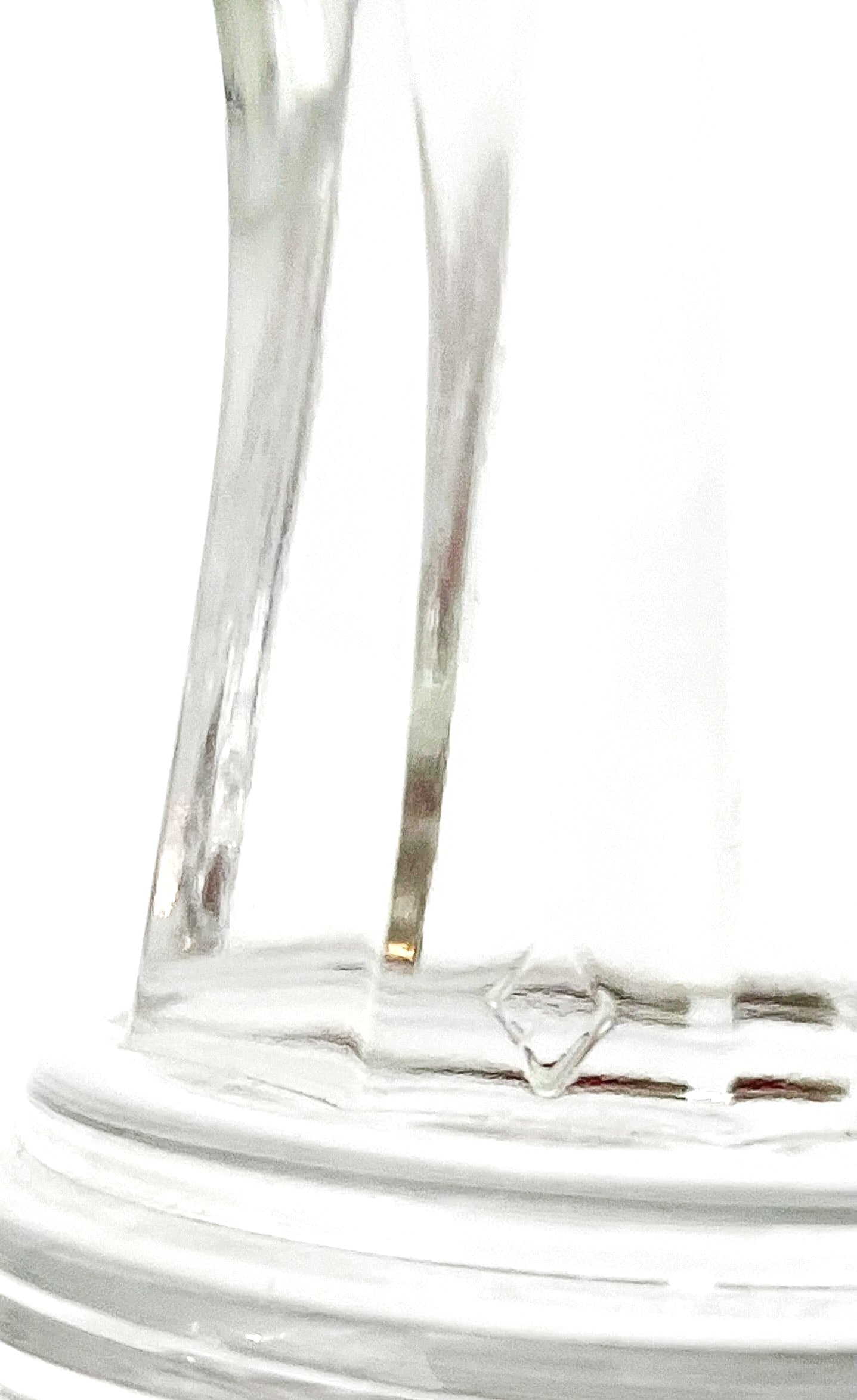 Pair of 1930s Heisey glass candelabras featuring rare molded grape cluster designs and elegant glass arms.