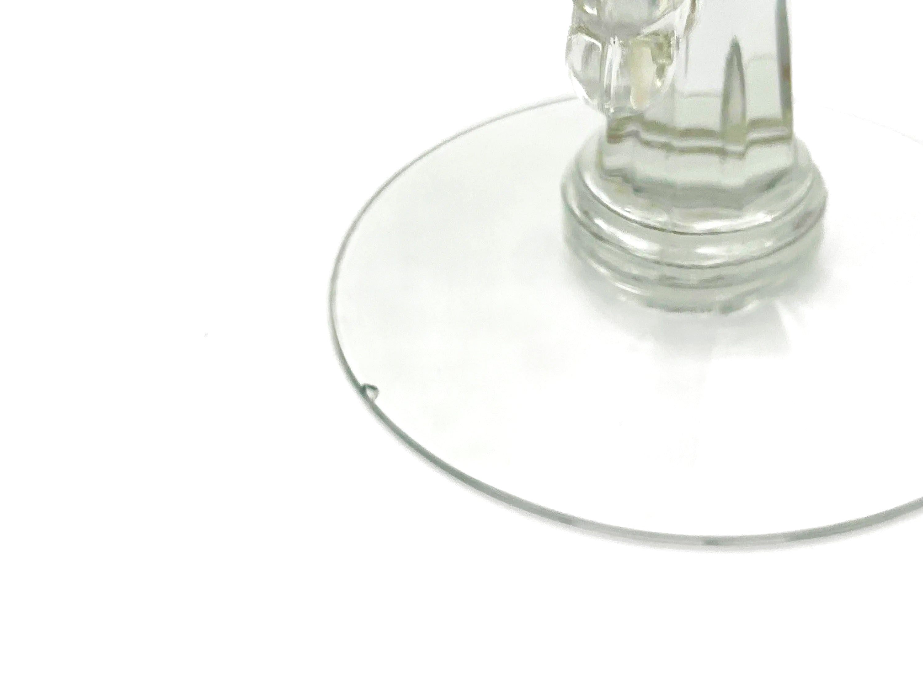 Pair of 1930s Heisey glass candelabras featuring rare molded grape cluster designs and elegant glass arms.