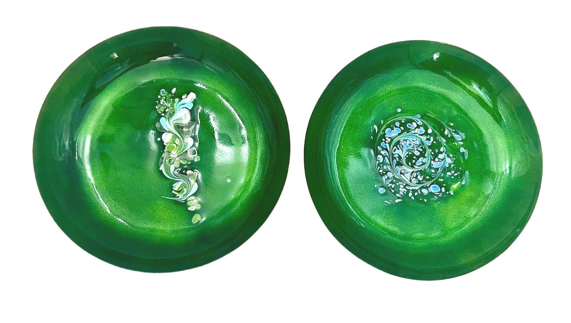 Pair of vintage copper wall art plates with mid-century designs, signed by Statham.