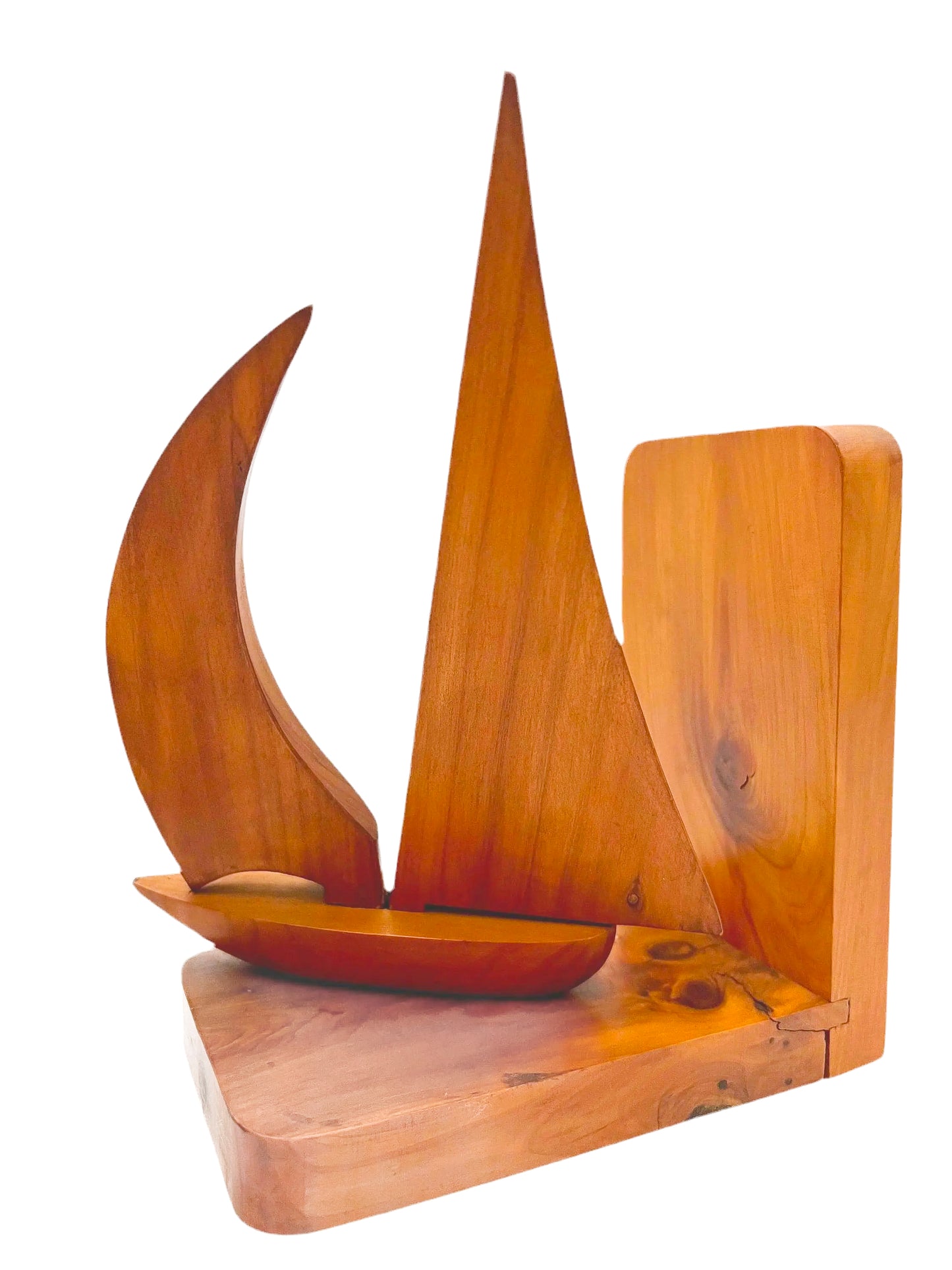 Pair of 1965 mid-century modern teak wood bookends carved in the shape of sailboats.