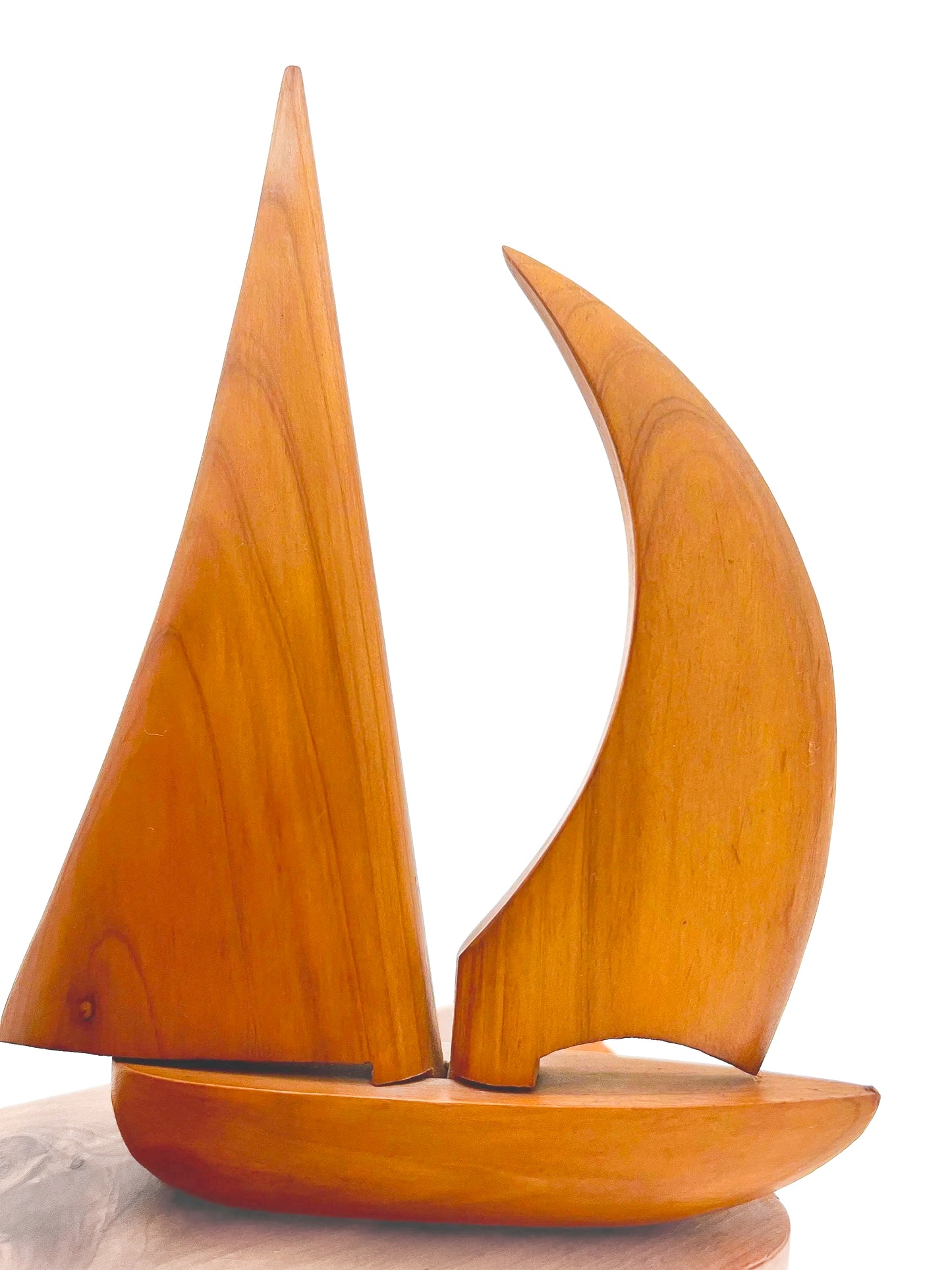 Pair of 1965 mid-century modern teak wood bookends carved in the shape of sailboats.